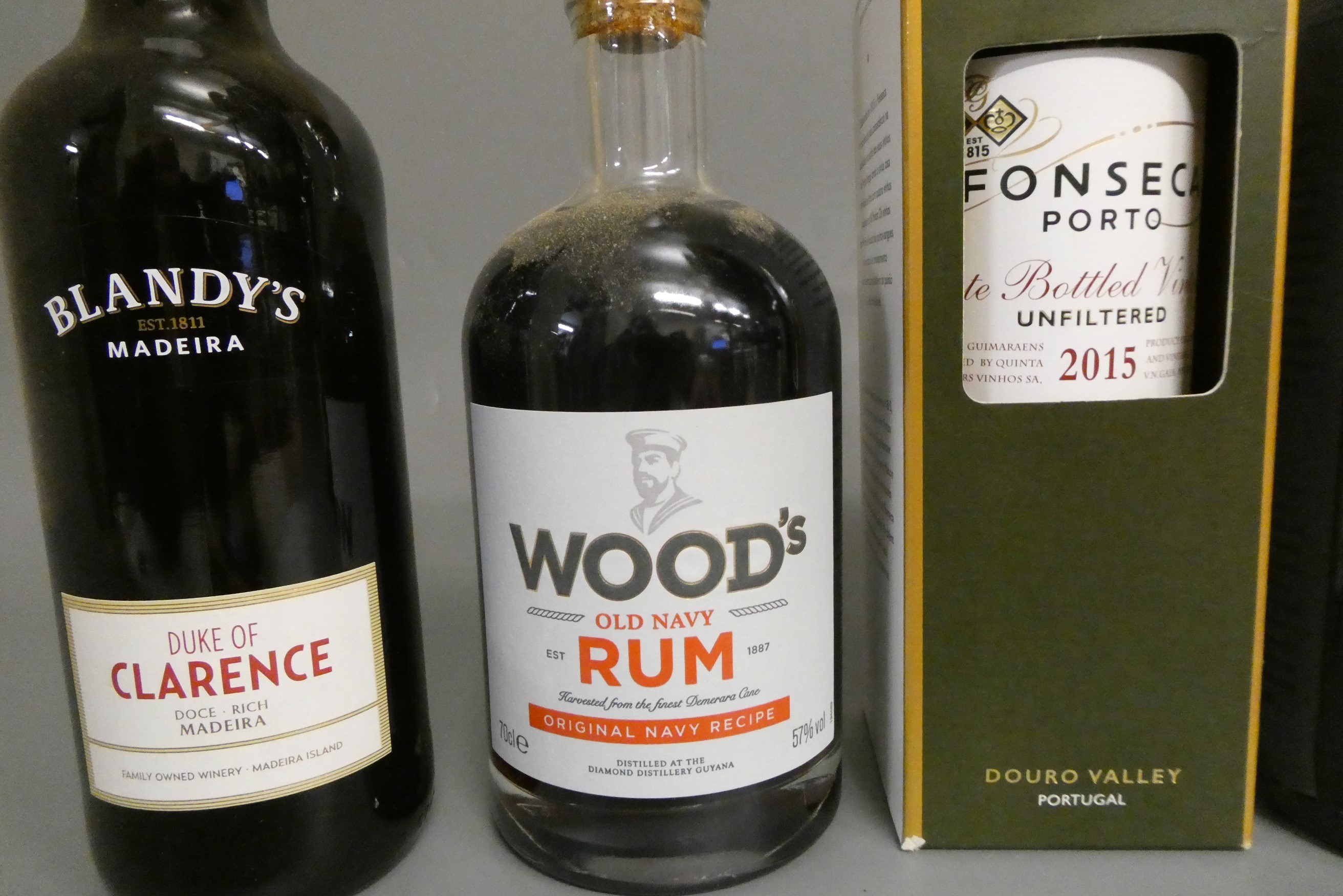 7 bottles of mixed alcohol Image