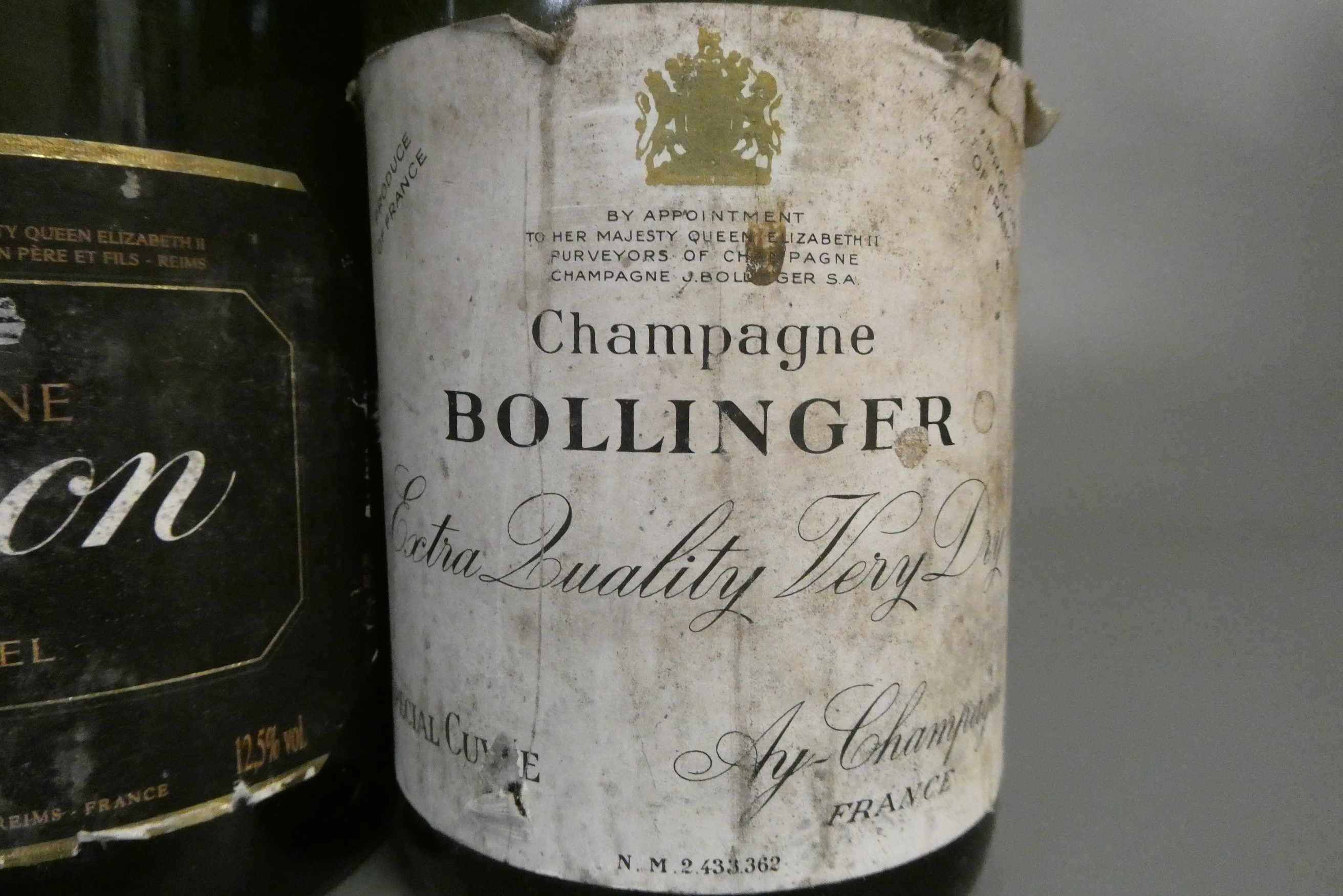 2 bottles of late 1970s champagne, comprising Bollinger extra quality very dry and a Lanson black Image