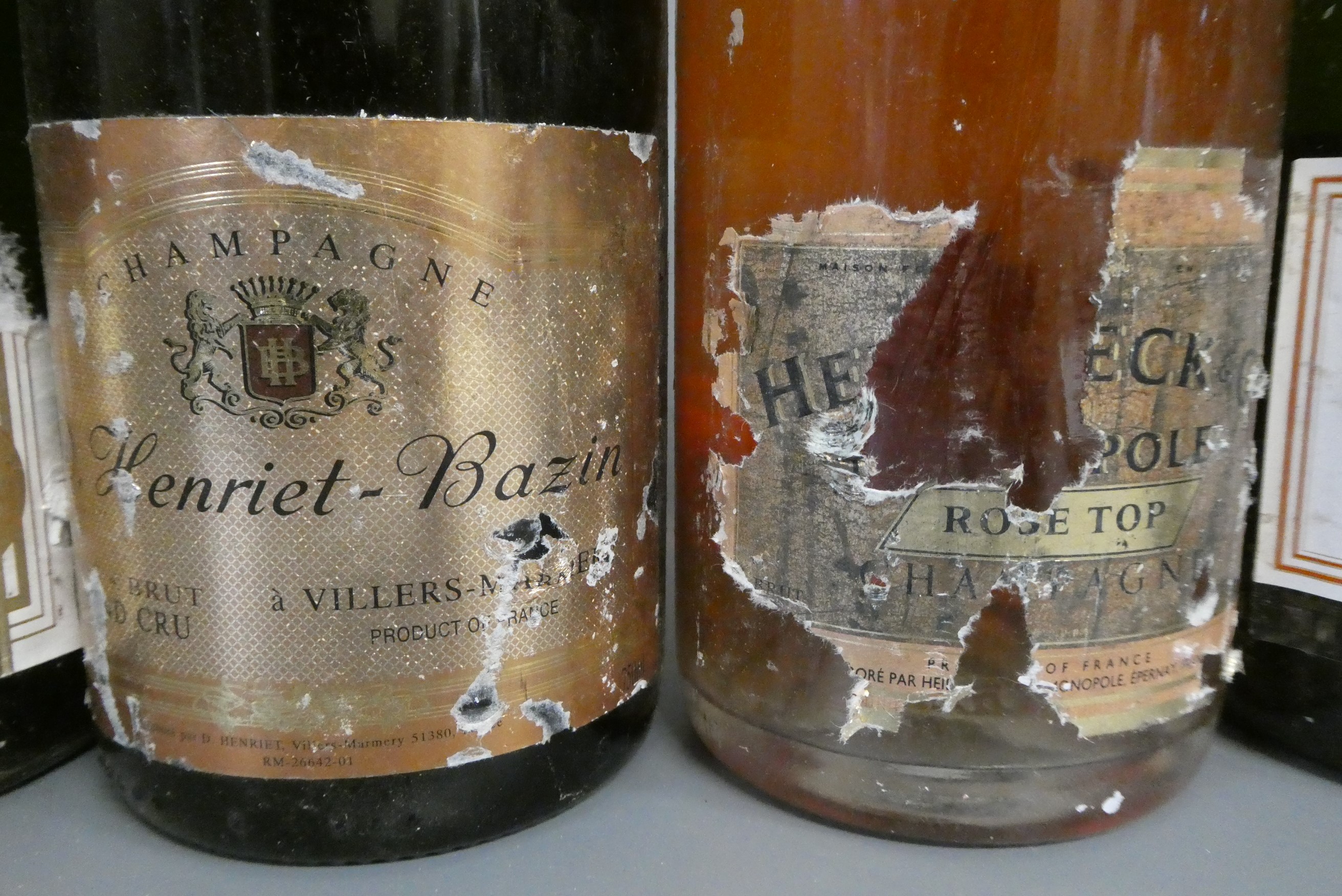 8 bottles of sparkling wine Image