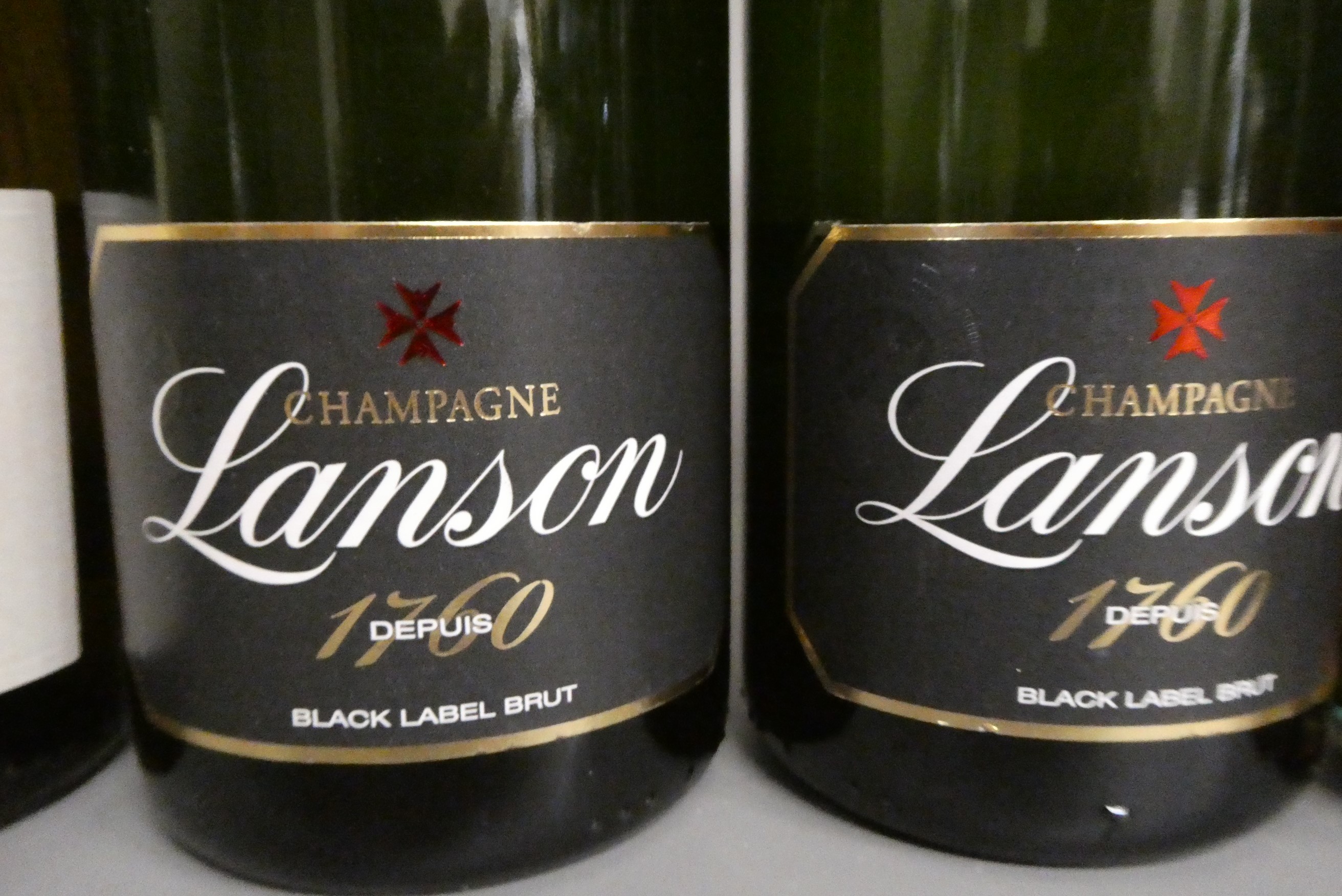 9 bottles sparkling wine Image