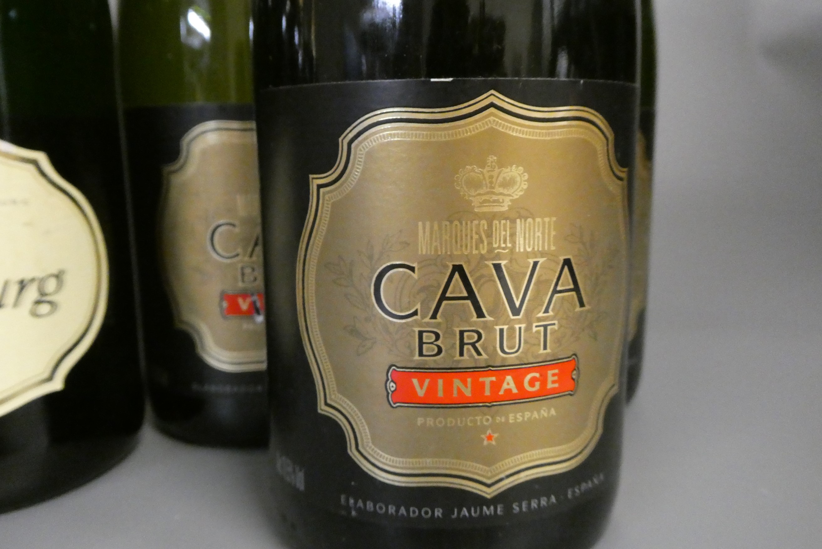 9 bottles sparkling wine Image