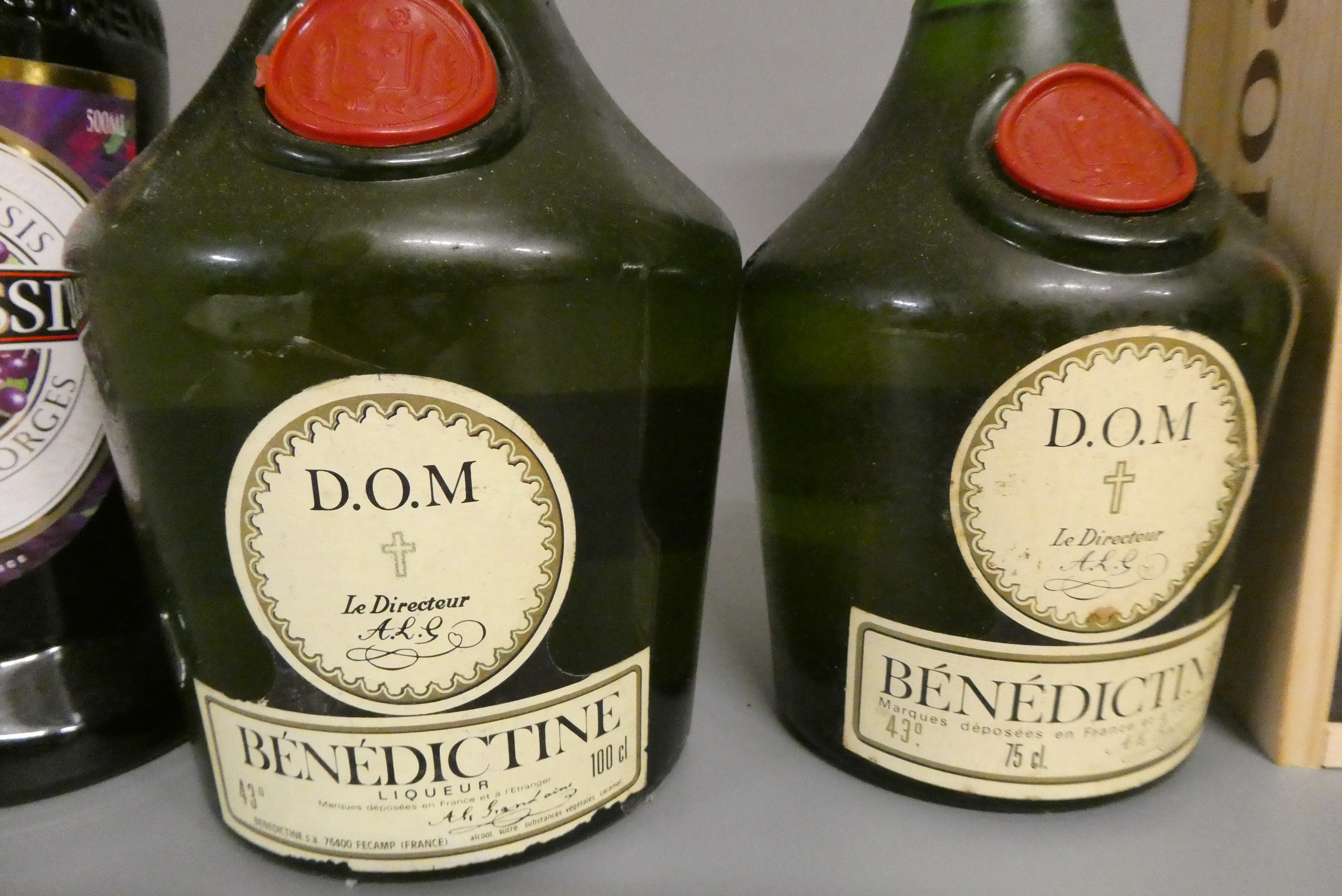 7 bottles of mixed alcohol Image