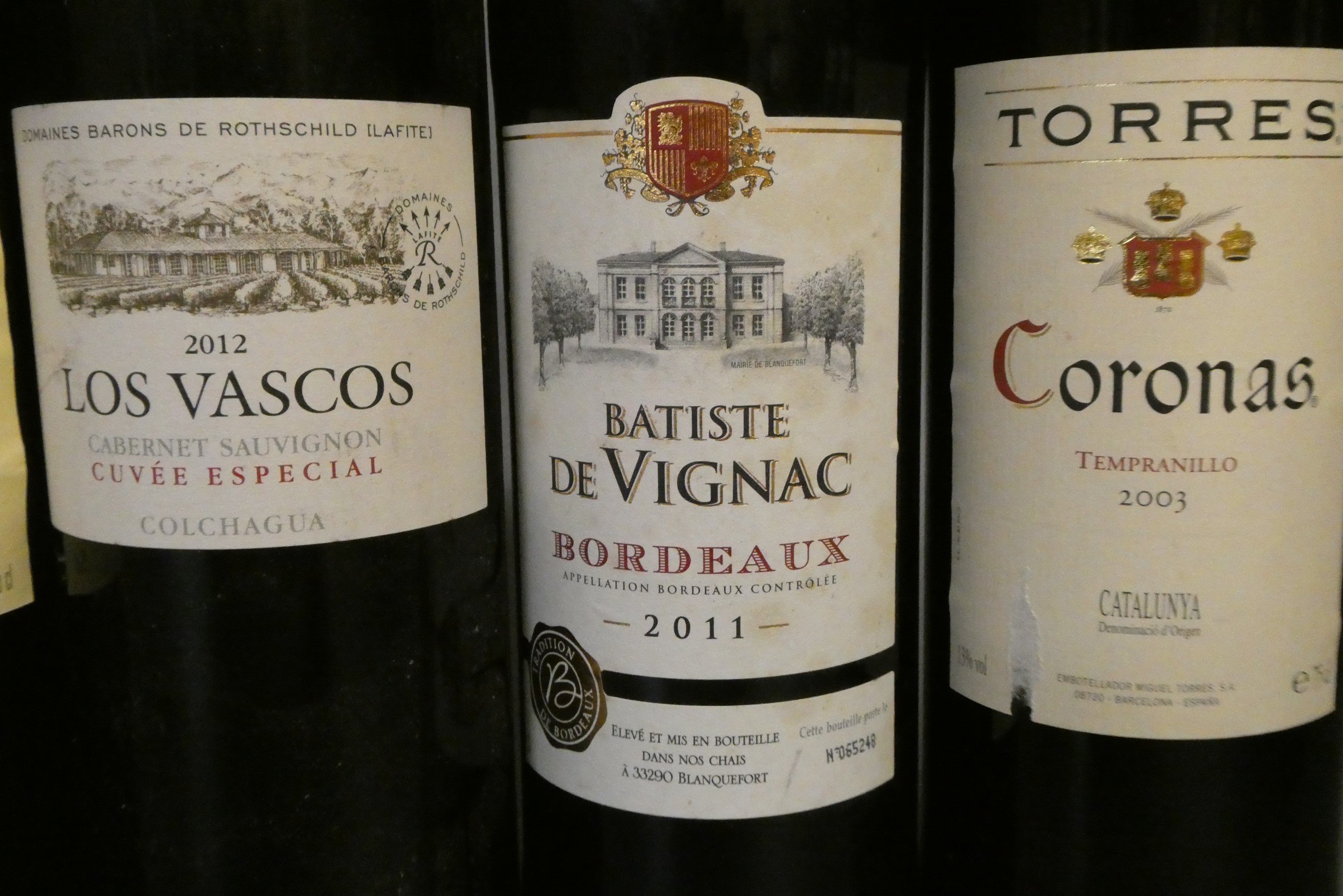 11 & 2 half bottles of European wine Image