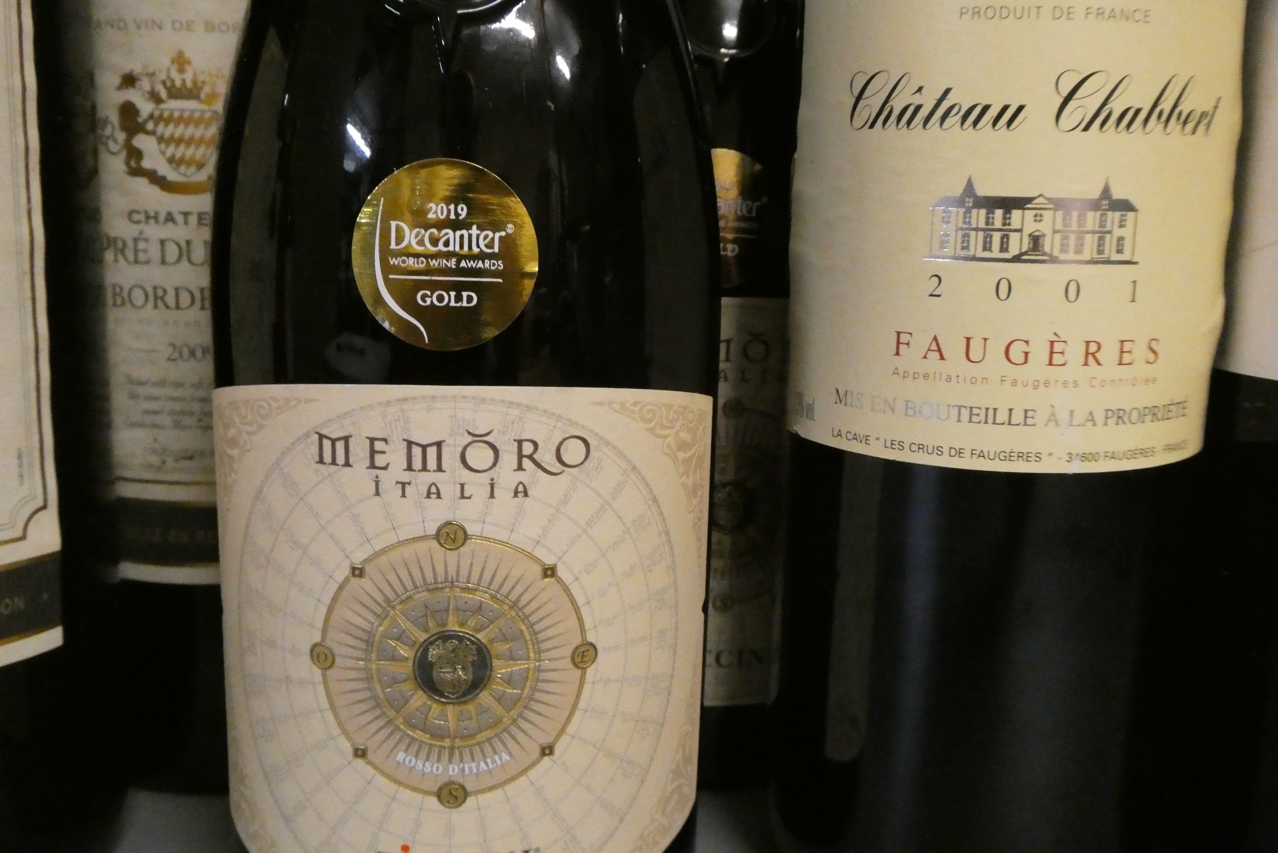 11 & 2 half bottles of European wine Image