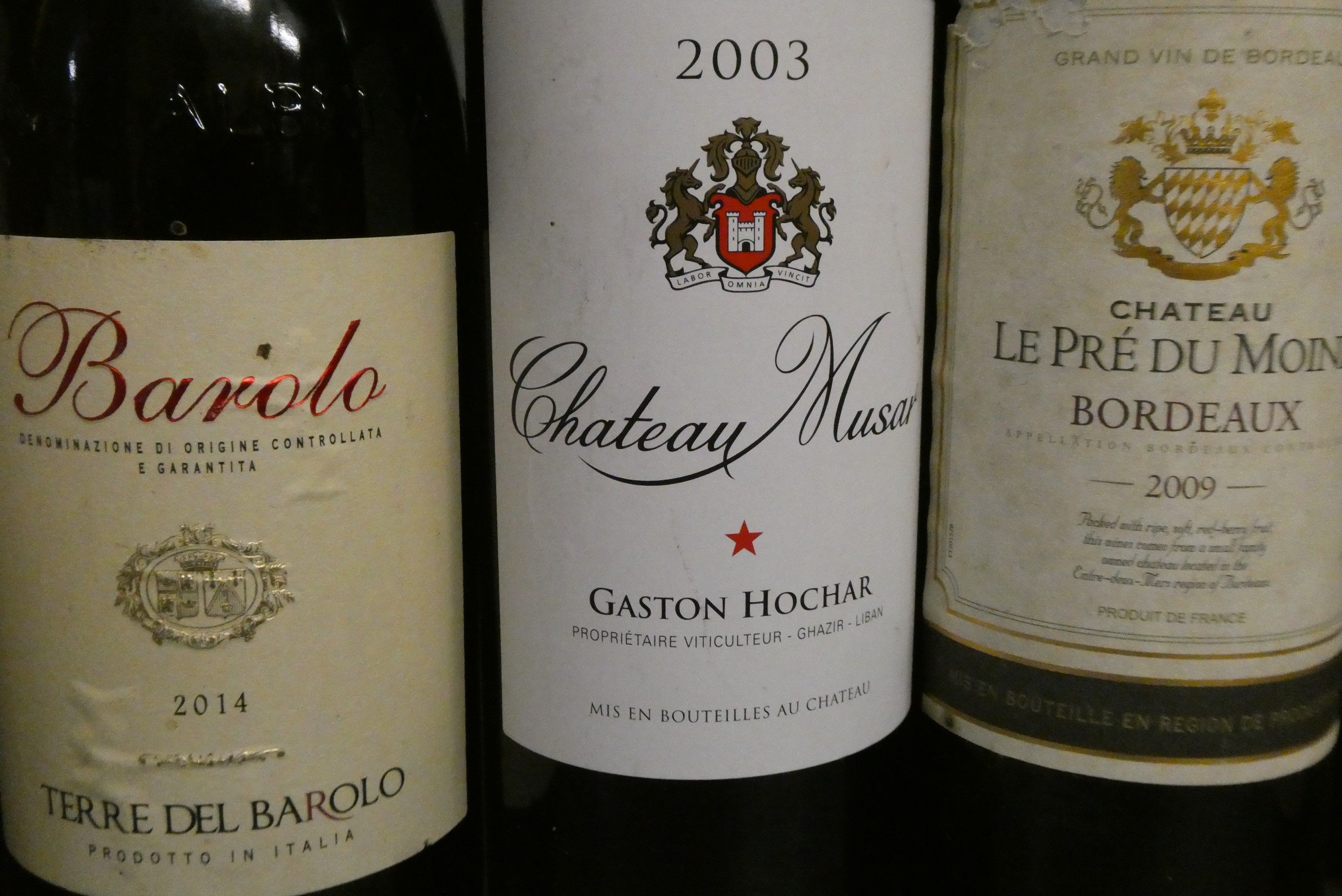 11 & 2 half bottles of European wine Image