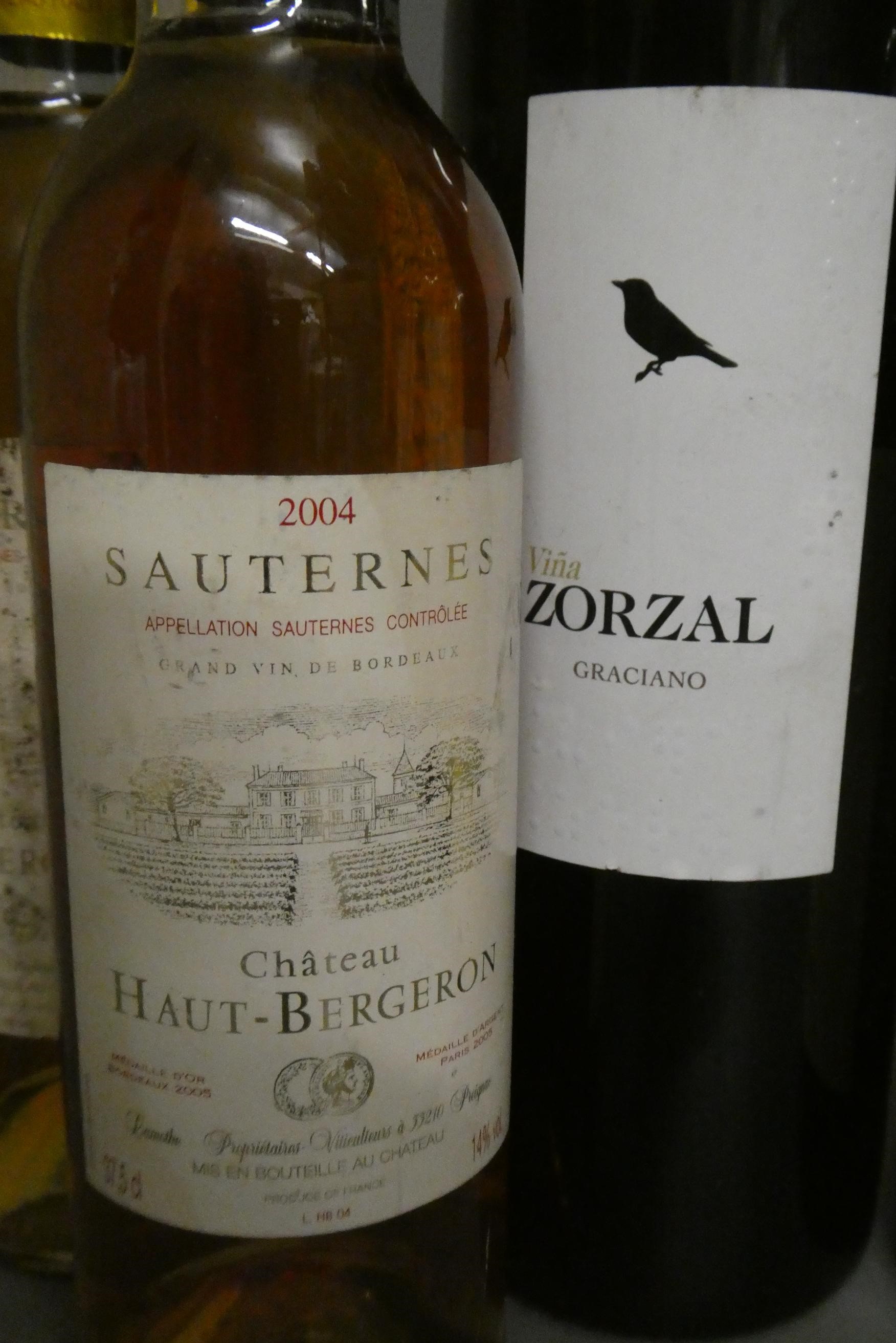 11 & 2 half bottles of European wine Image