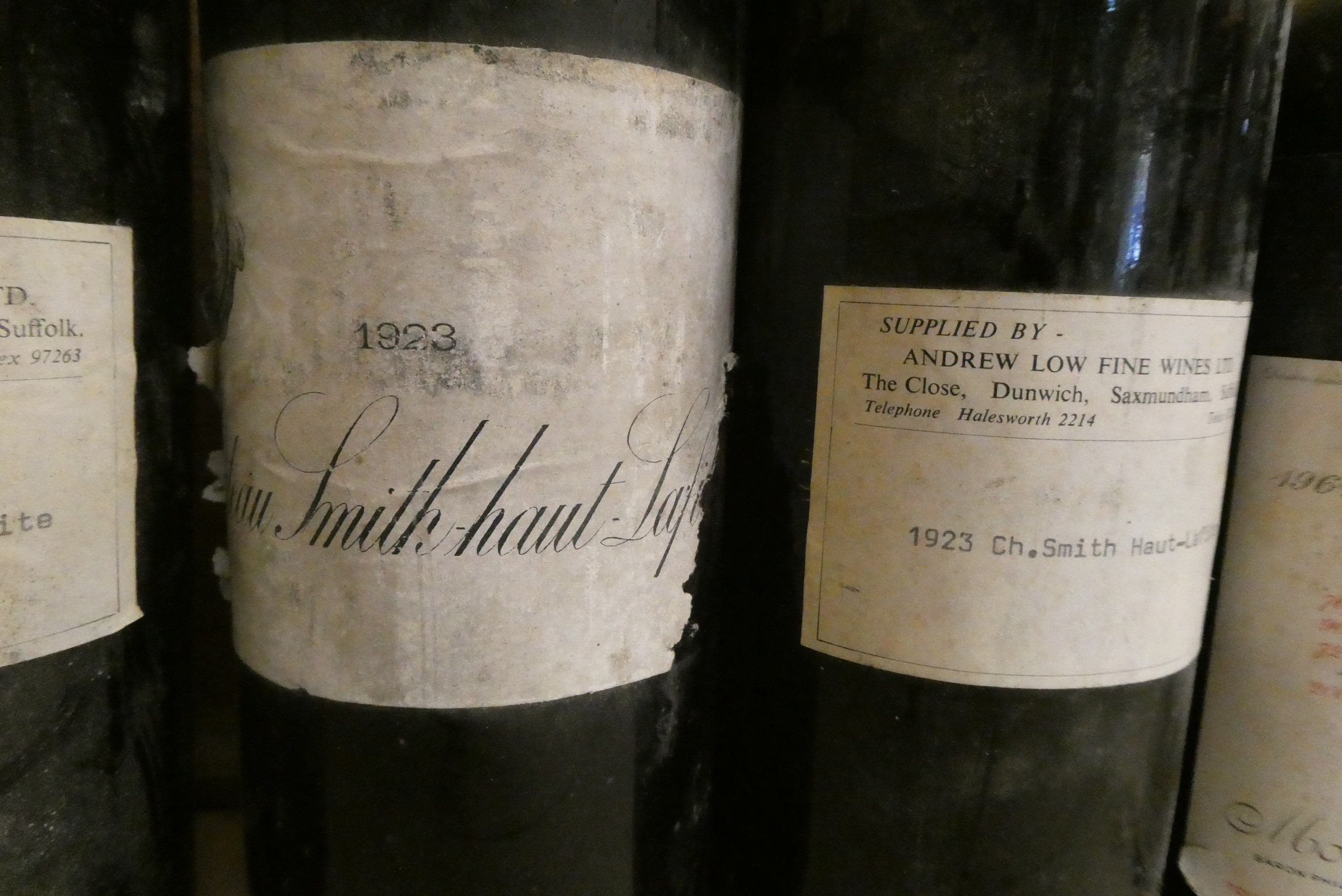 4 bottles Chateau Smith-Haut-Lafite, 1923, together with 1 half Chateau Mouton Rothschild 1961 & 1 Image