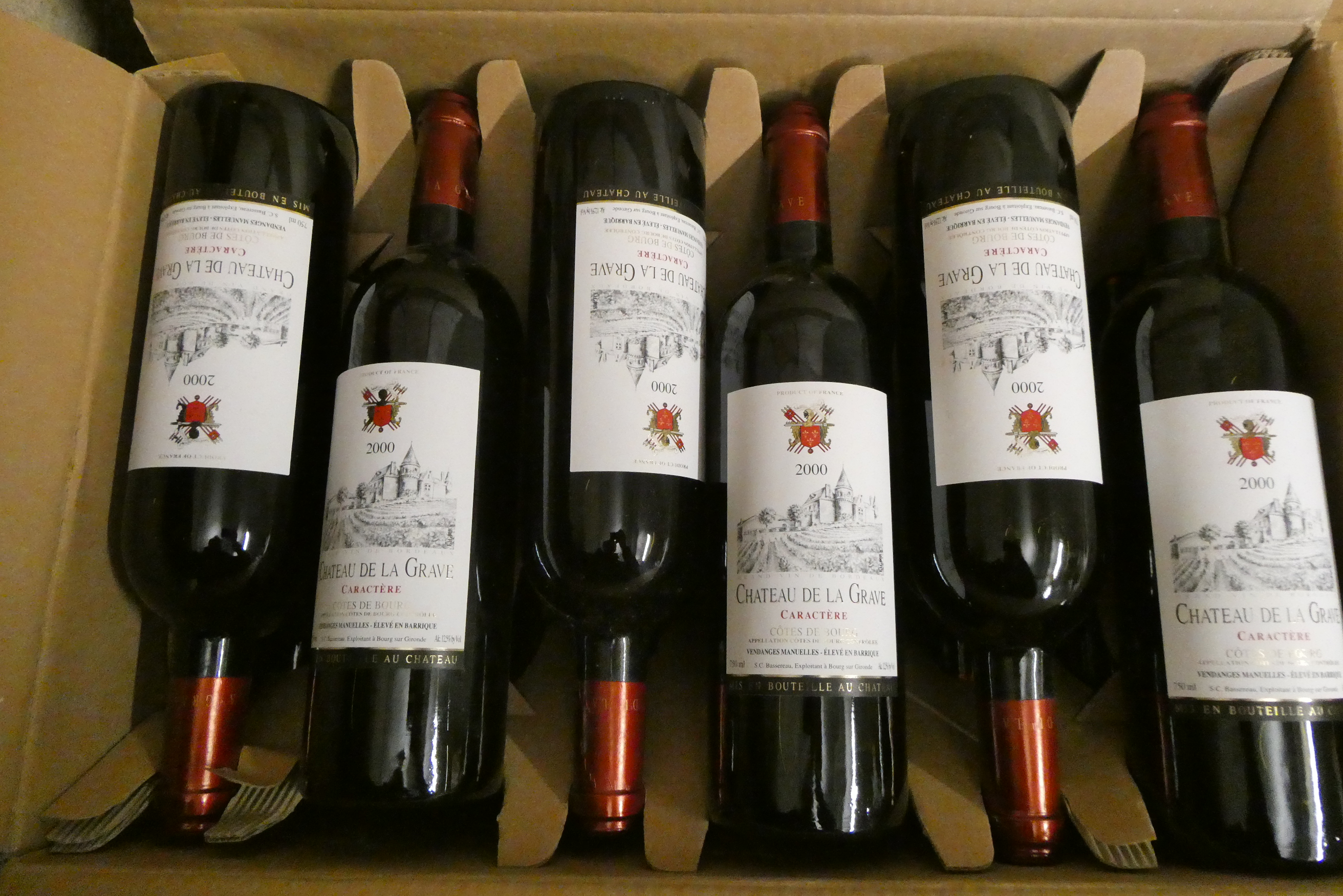 12 bottles Chateau De La Grave, 2000, Caractere, Cotes de Bourg, OC (Est. plus 24% premium inc. VAT) Image