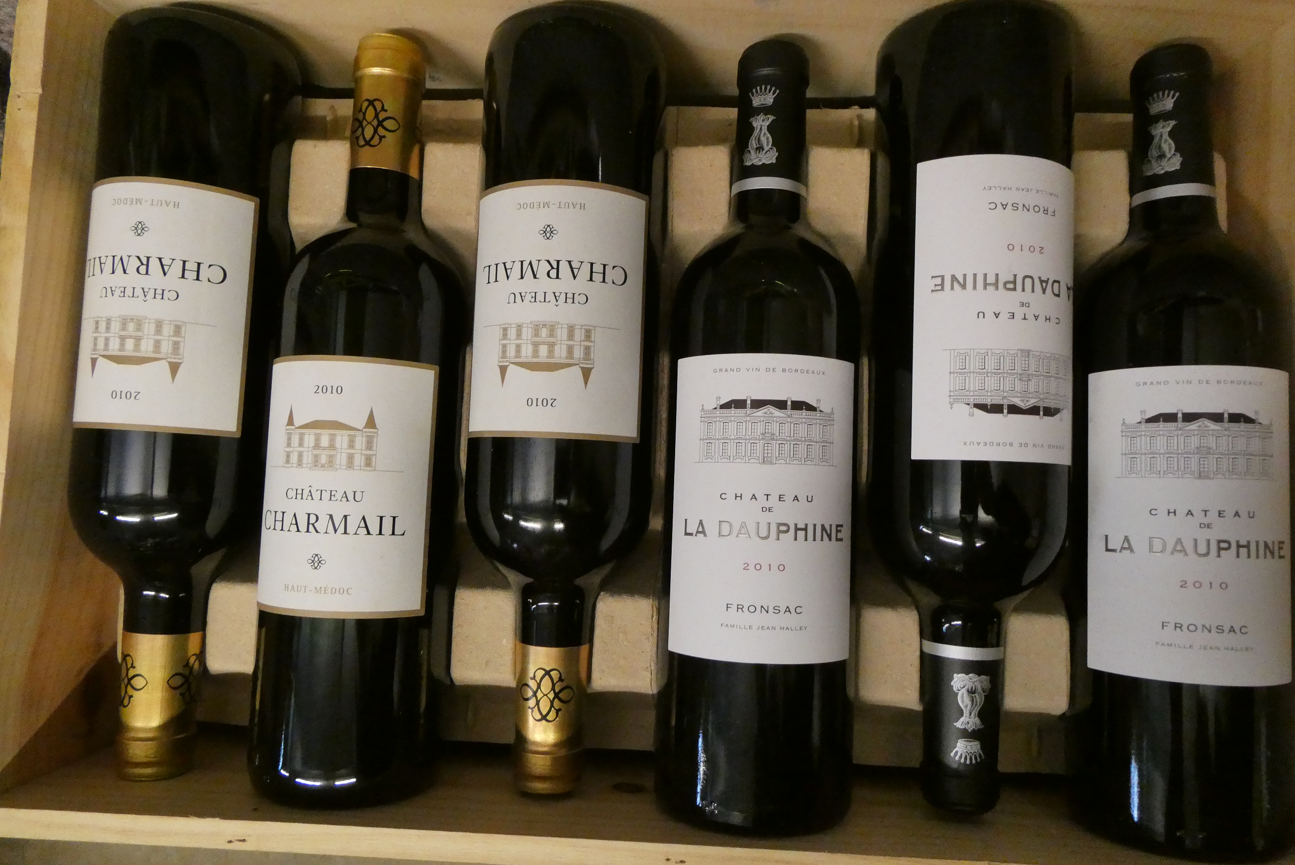 12 bottles 2010 vintage bordeaux, comprising 6 Chateau de La Dauphine, Fronsac, & 6 Chateau Charmail Image