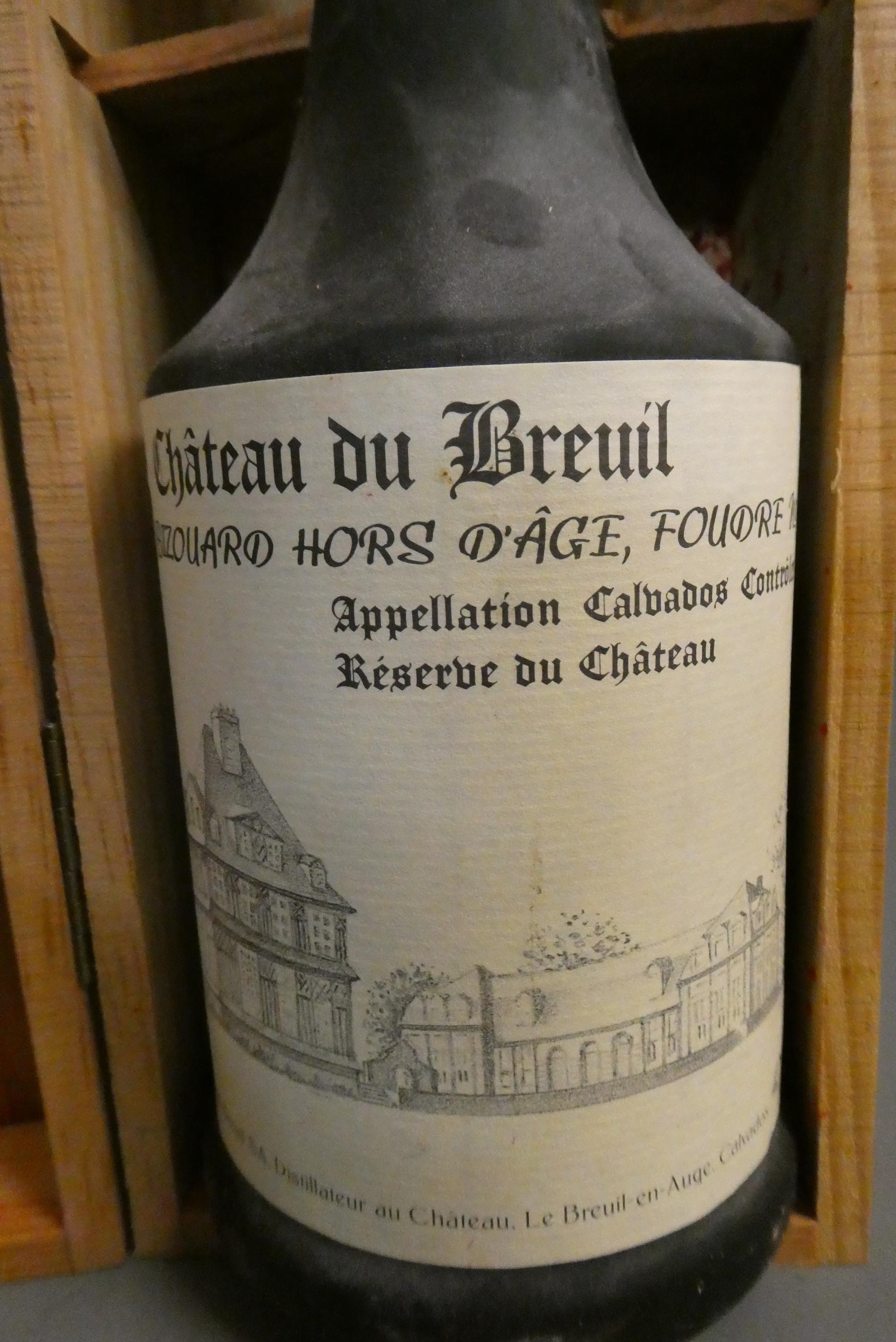 1 bottle Chateau du Breuil, calvados bizouard hors d'age, no. 23, 42%, boxed, together with a Image