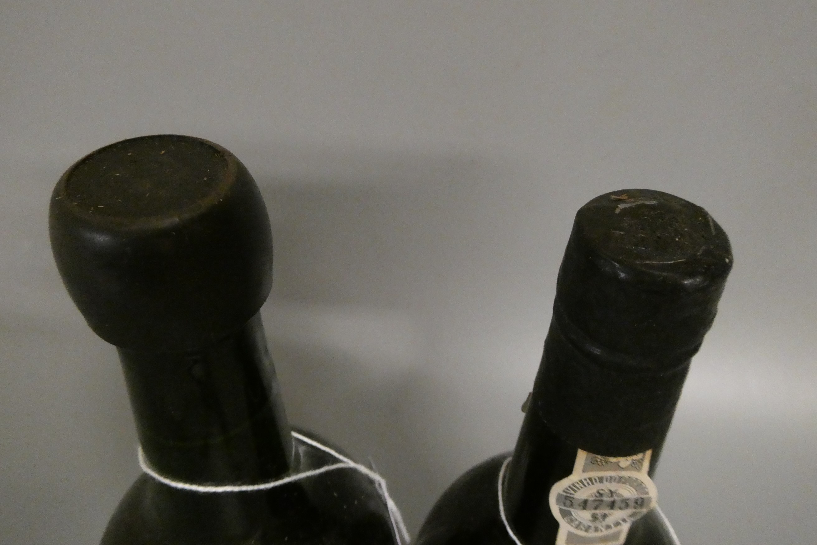 2 bottles of Warres Port, comprising a 1 bottle 1987 vintage port and 1 1970 bottle by Charles Image