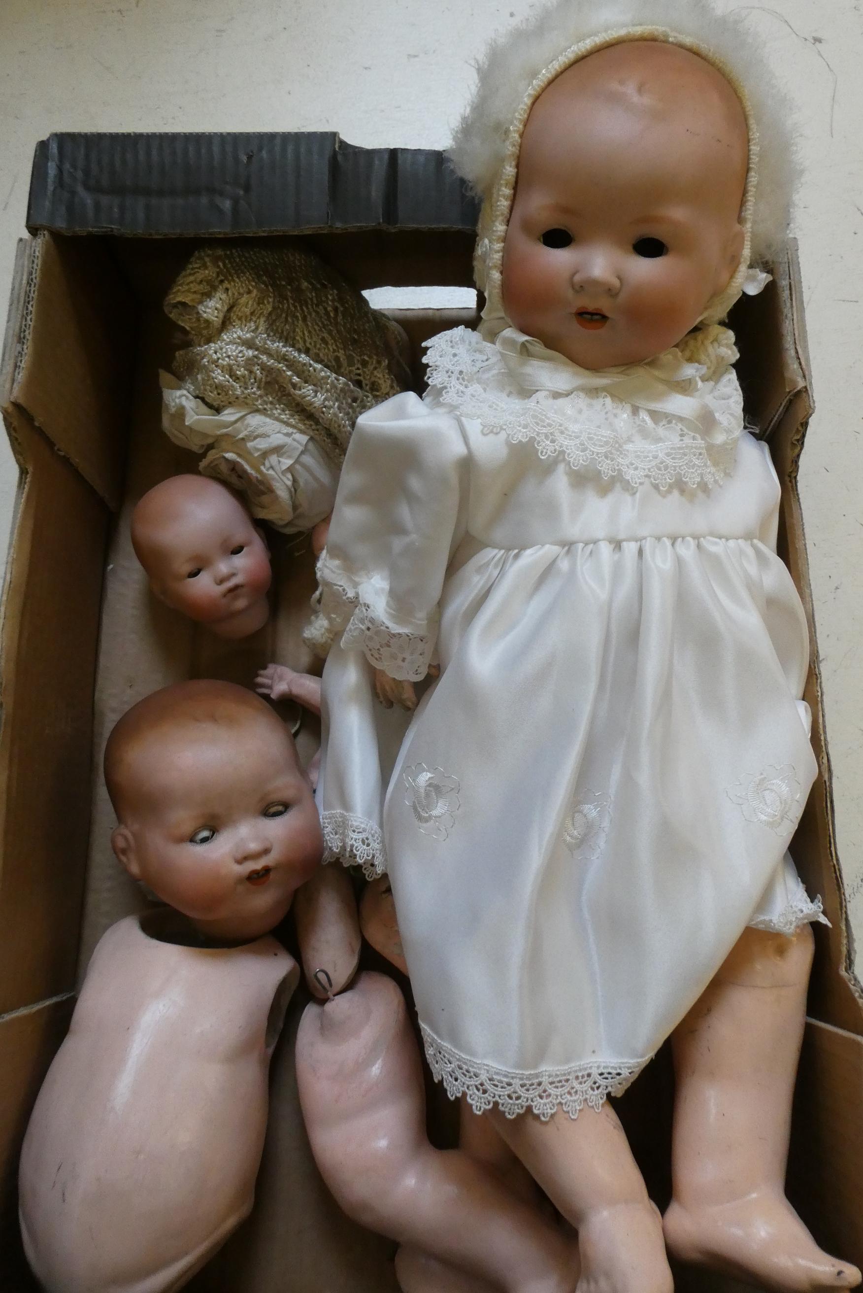Three Armand Marseille dolls, comprising an 18" and 22" AM 351 and a 12 1/2" AM 341 Image
