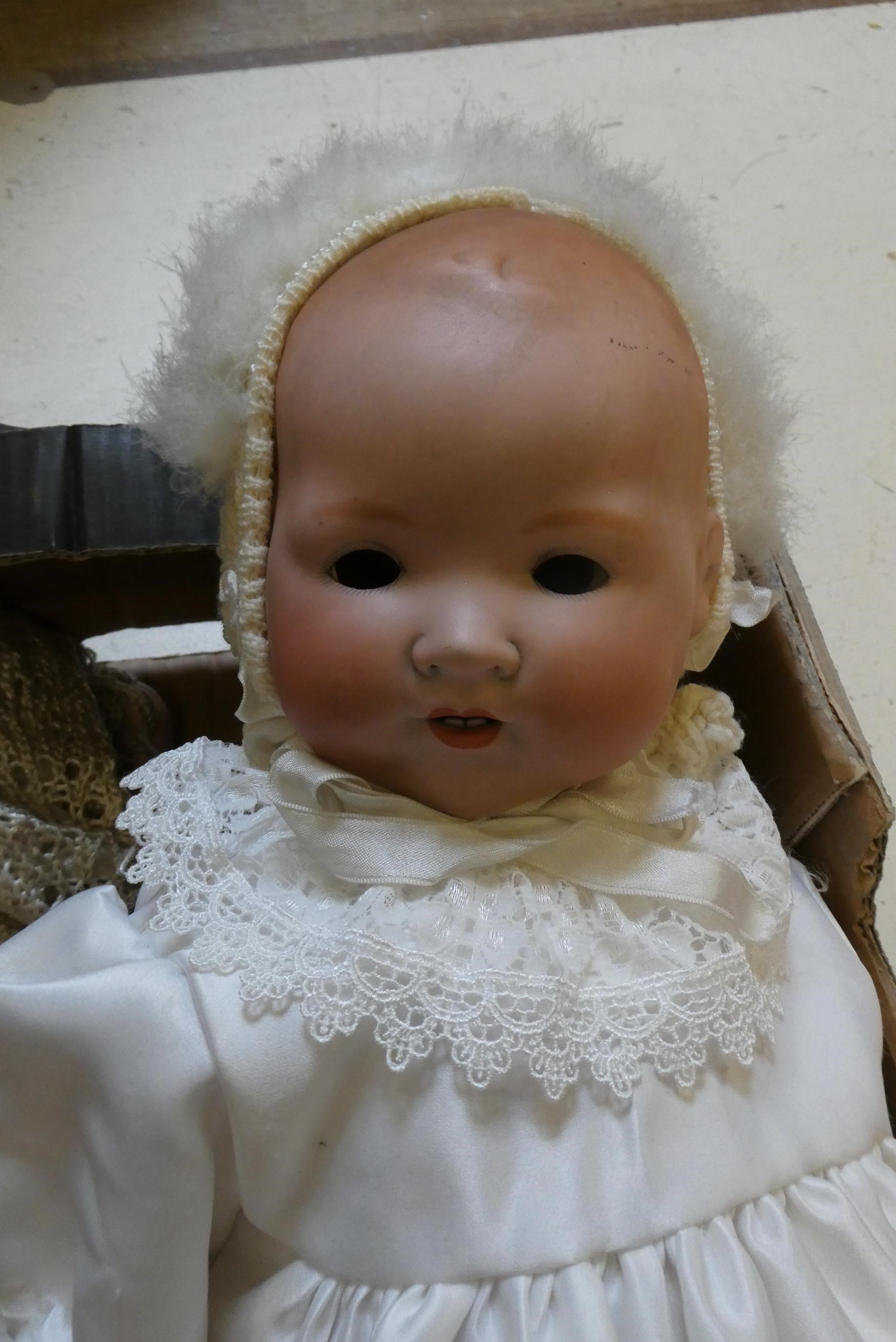 Three Armand Marseille dolls, comprising an 18" and 22" AM 351 and a 12 1/2" AM 341 Image