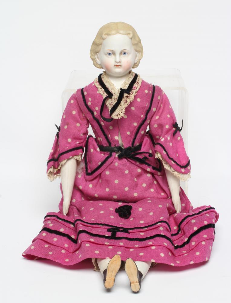 An early ABG bisque shoulder head doll, c. 1890, with moulded hair, painted features, fabric body, Image