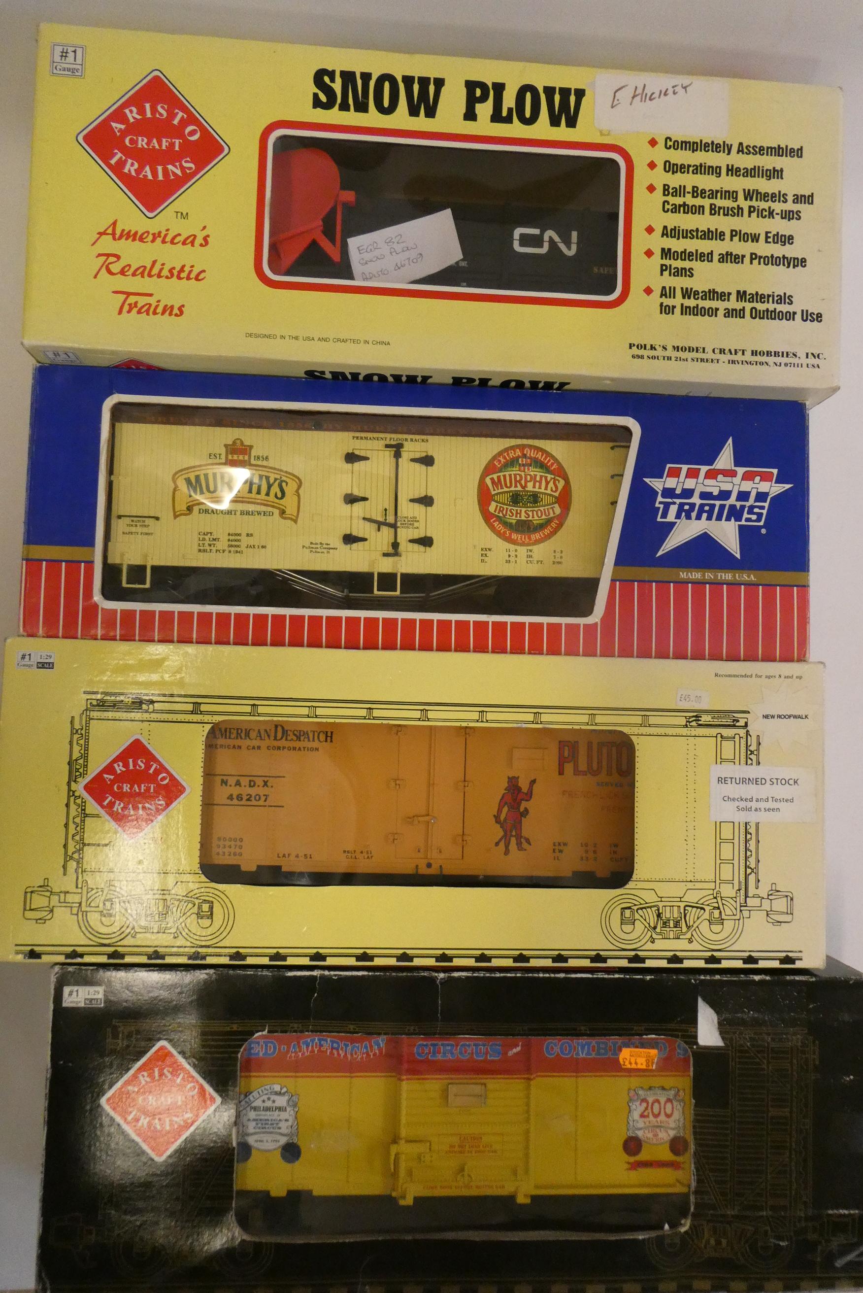 Eight Aristocraft and US Trains box cars including circus car, Murphy's Irish Stout, Pluto Water, Image