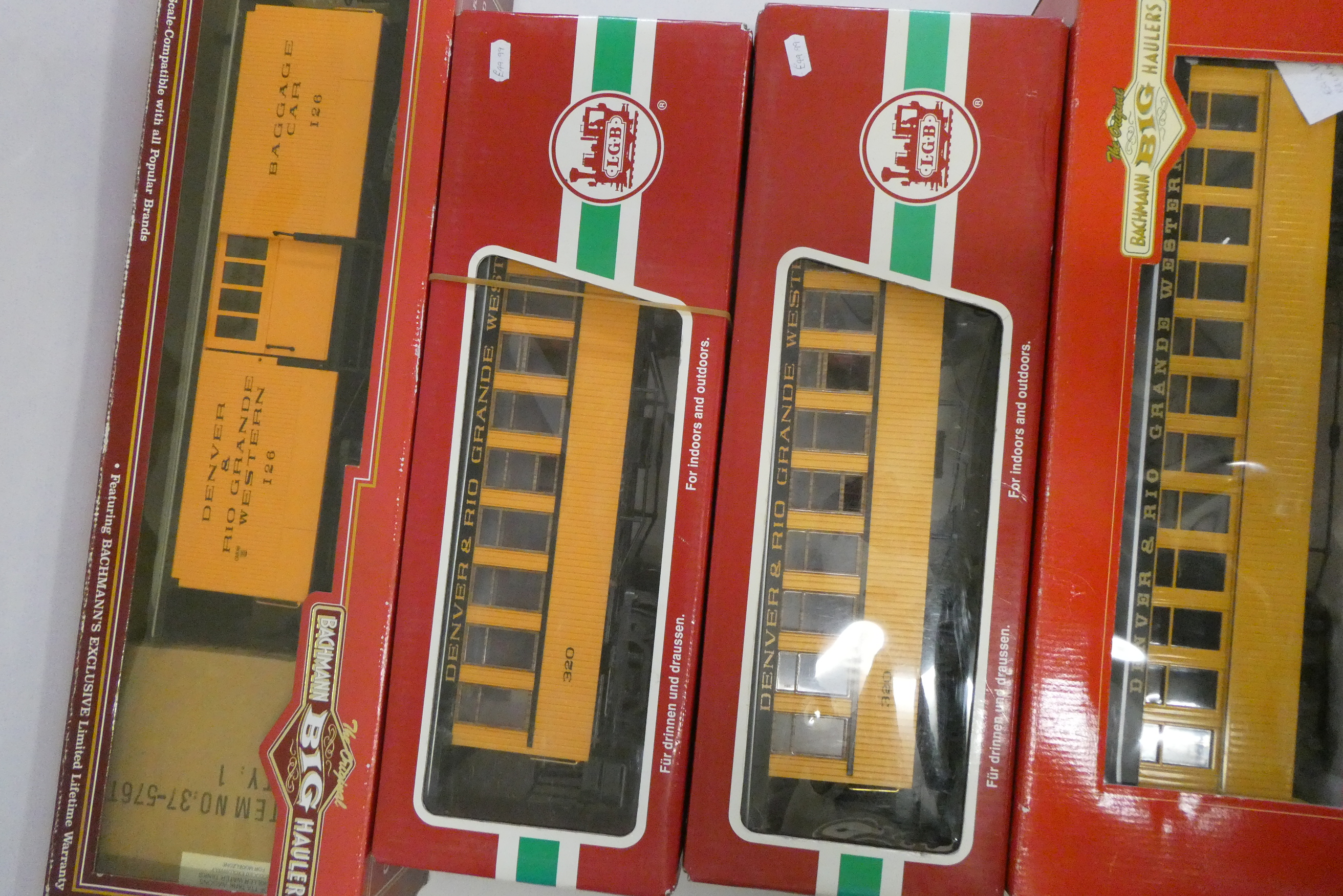 Four Denver and Rio Grande bogie passenger coaches including baggage car, all items boxed, good to Image