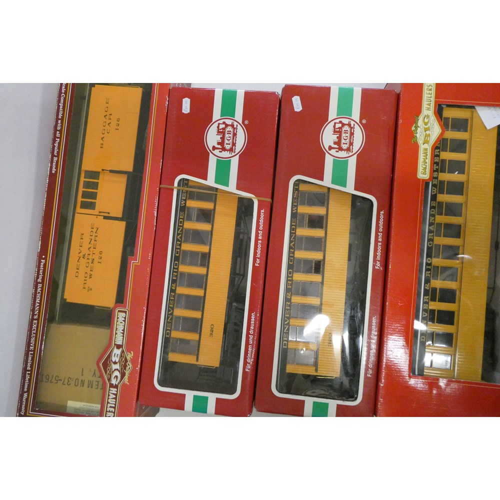 Four Denver and Rio Grande bogie passenger coaches including baggage car, all items boxed, good to Image