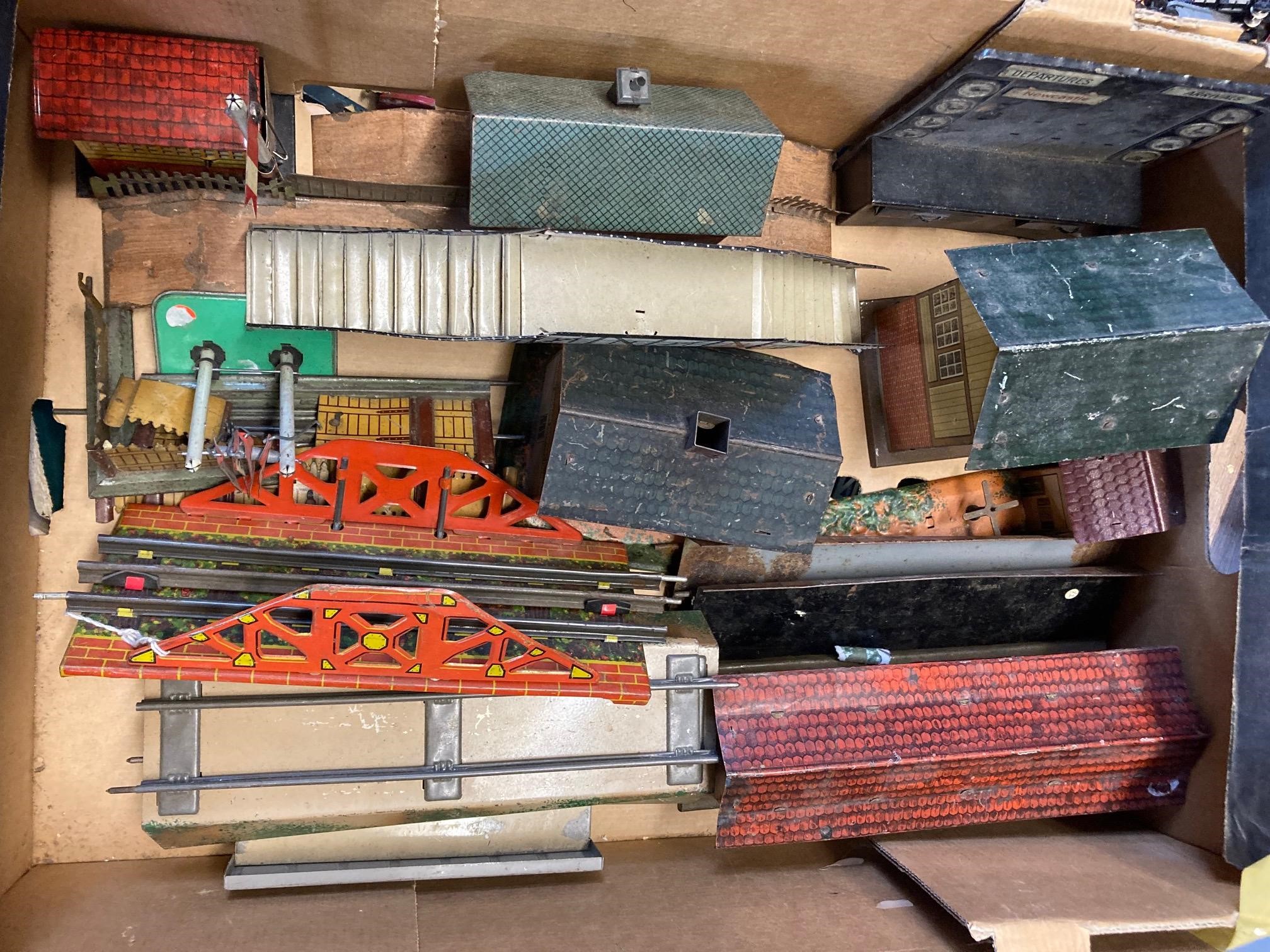 O gauge one gauge trackside items by German makers including signals, lamps and footbridge, some Image