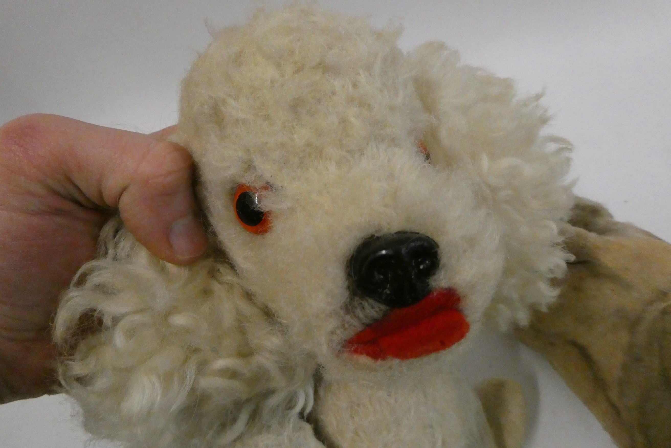 Two vintage automaton musical dogs, both with wind-up clockwork mechanism and heads that move with Image