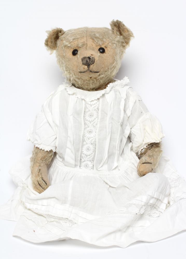 A centre seam early steiff teddy bear, c.1904, with black button eyes, straw filling, sewn nose, Image