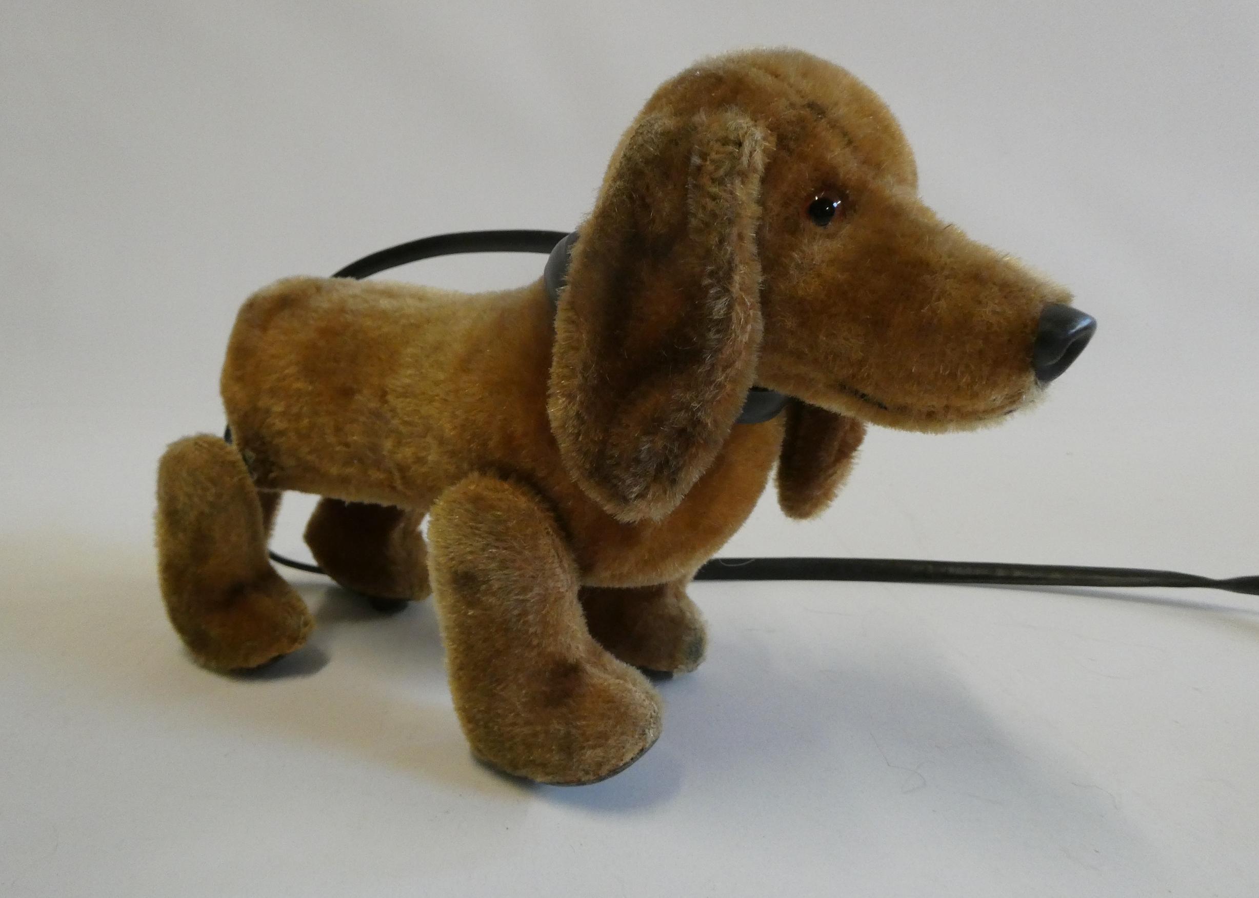 Schuco walking sausage dog, 1950s, with "trip-trap" motion and lead, 11" long Image