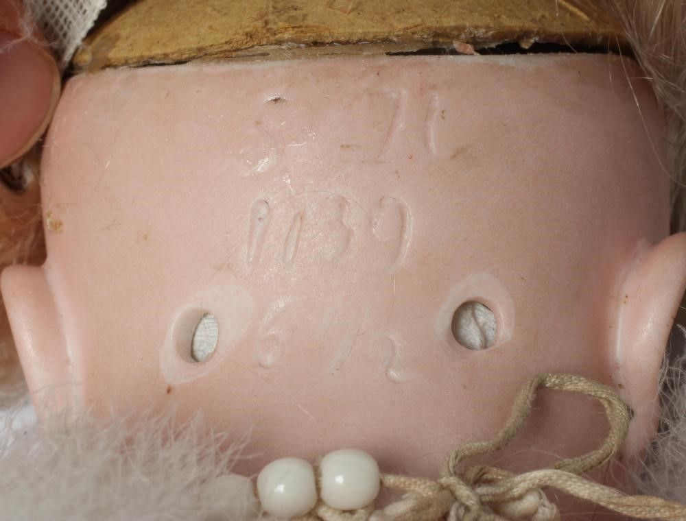 A Simon & Halbig bisque socket head doll Image