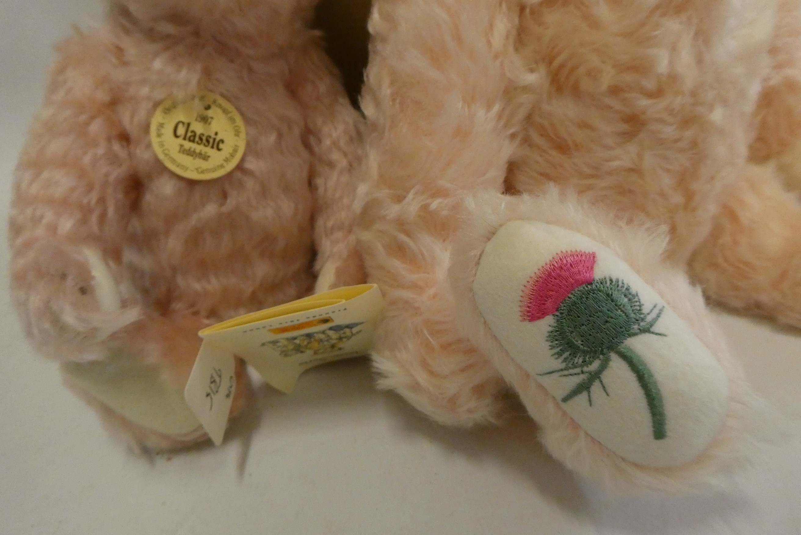 Two Steiff bears, comprising a boxed 38cm growling Queen Mother rose with certificate and a 25cm Image