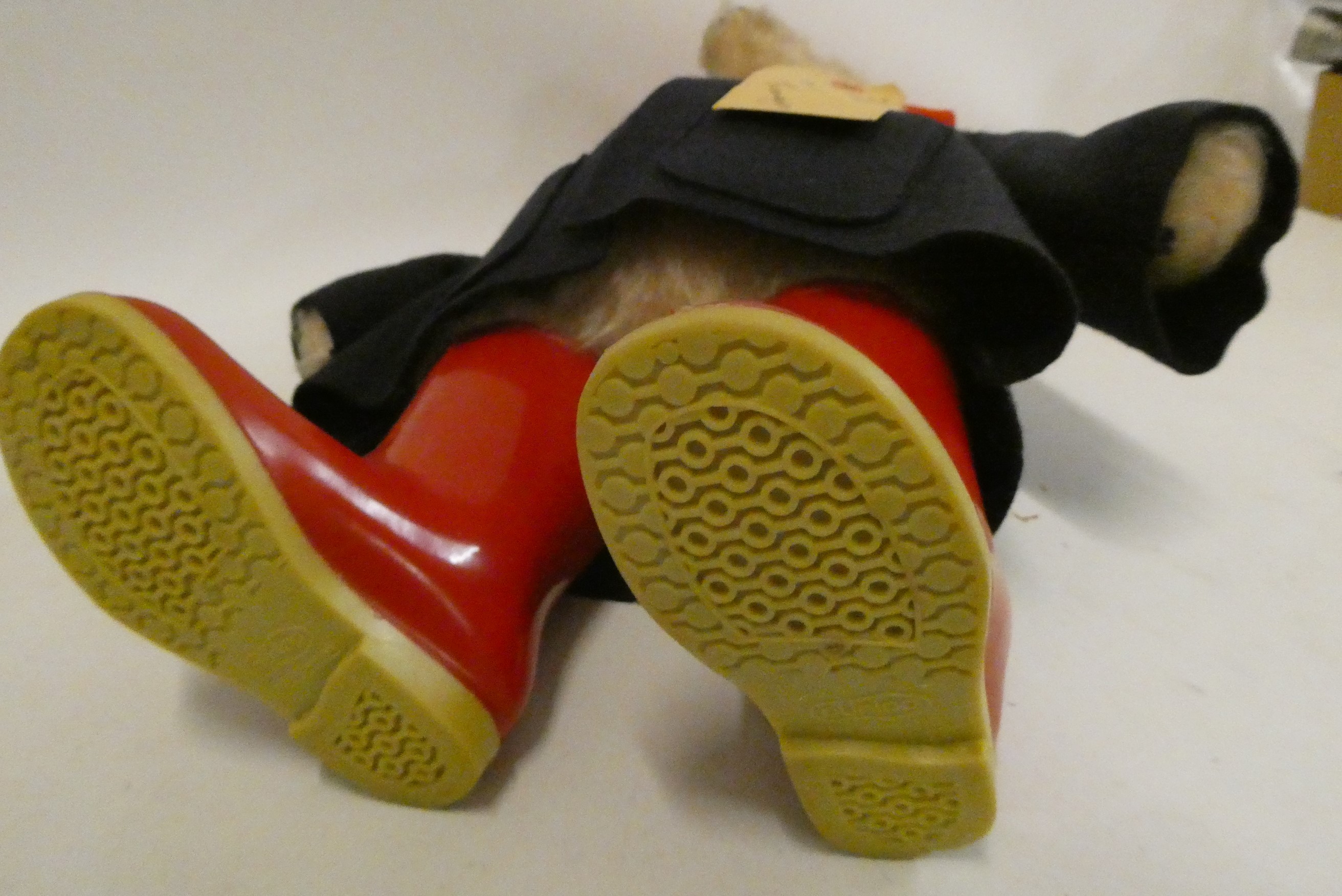 Paddington bear, with amber eyes, red felt hat, blue felt coat, red Dunlop boots and card label, 18 Image