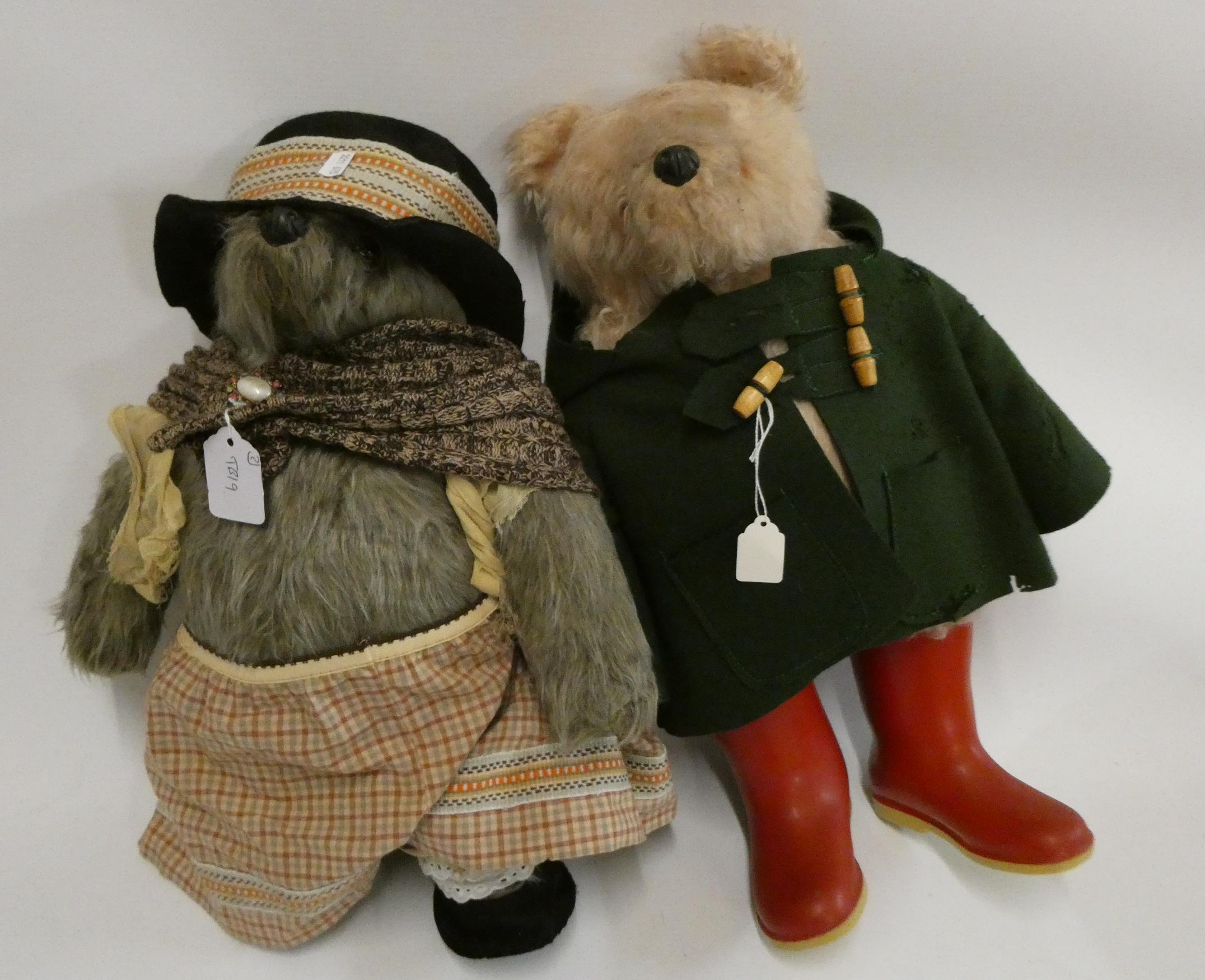 Paddington and an Aunt Lucy Bear, Paddington in a Green felt coat and red Dunlop boots, Lucy with Image