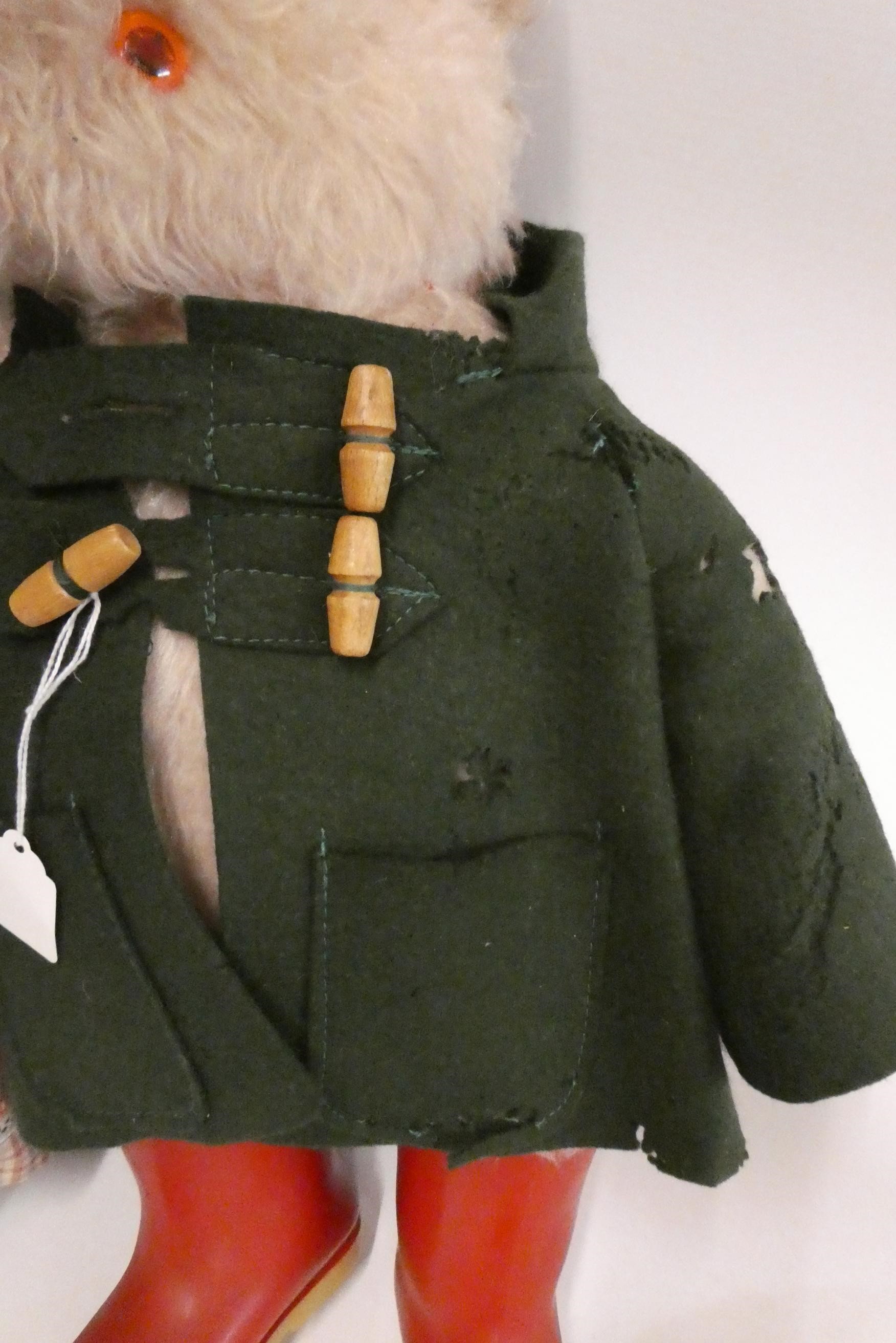 Paddington and an Aunt Lucy Bear, Paddington in a Green felt coat and red Dunlop boots, Lucy with Image