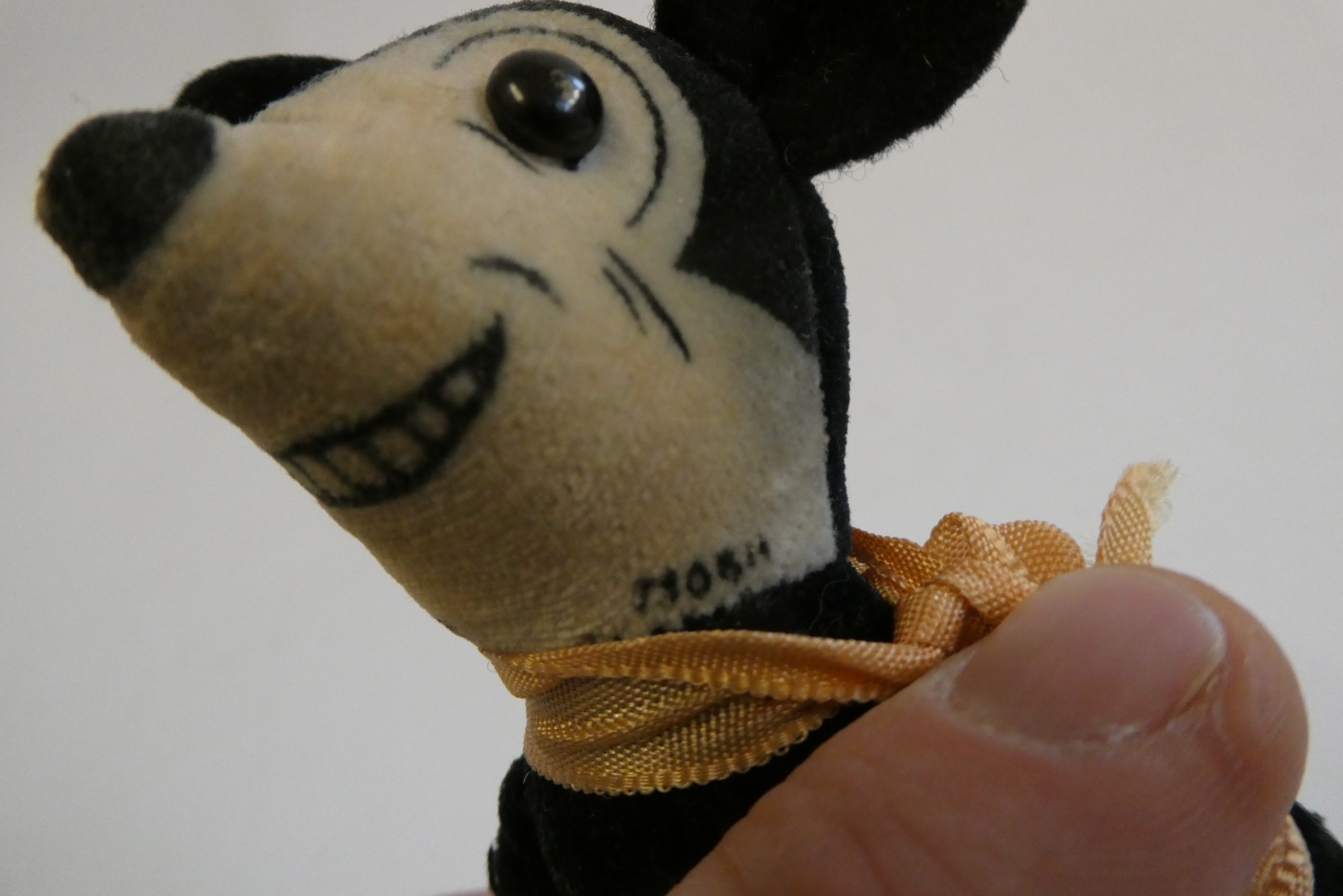 Deans felt Mickey Mouse, with shoe button eyes, registration number to neck, red shorts and yellow Image