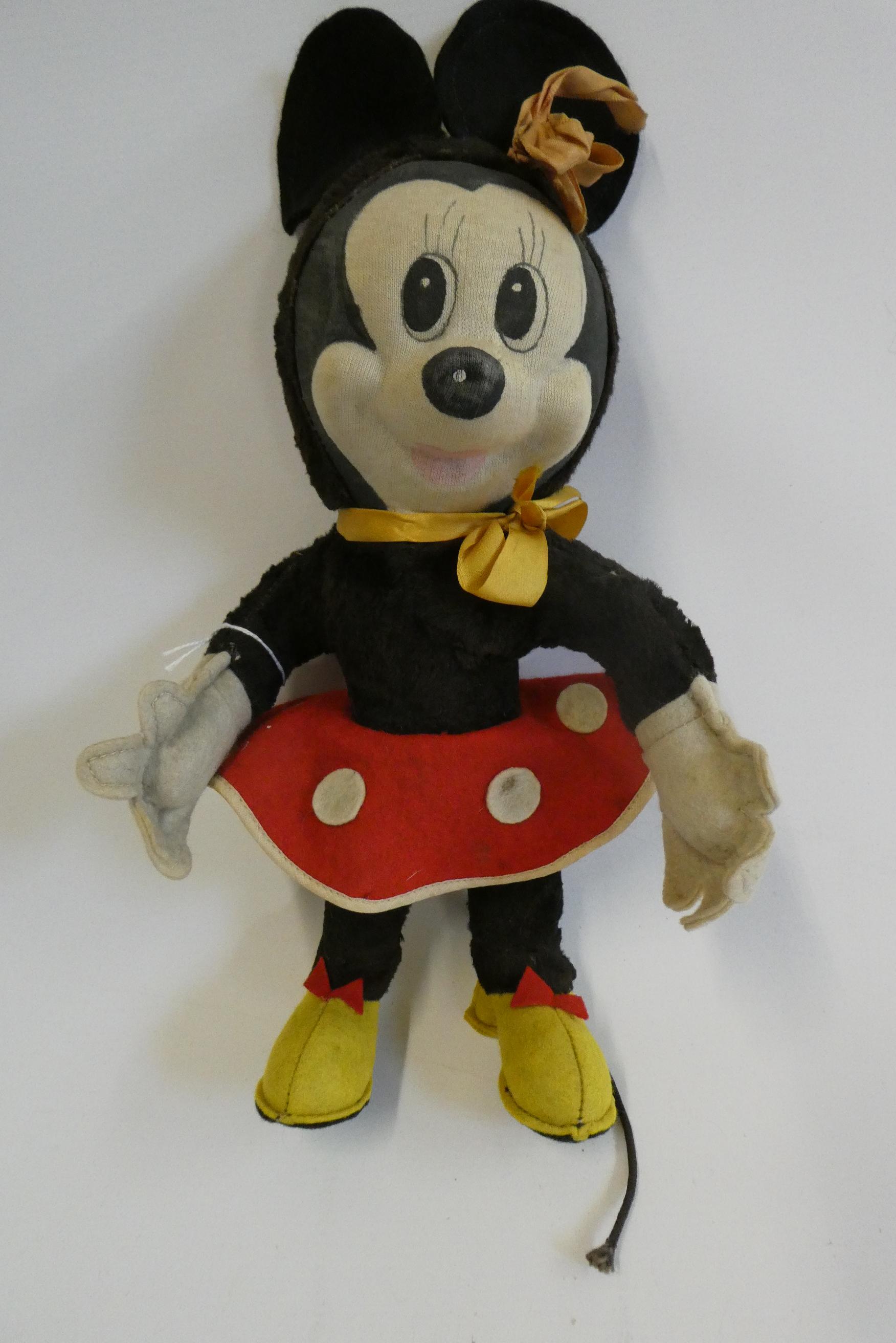 Merrythought Minnie Mouse, with fabric face, plush body, felt clothing and maker's label to foot, Image