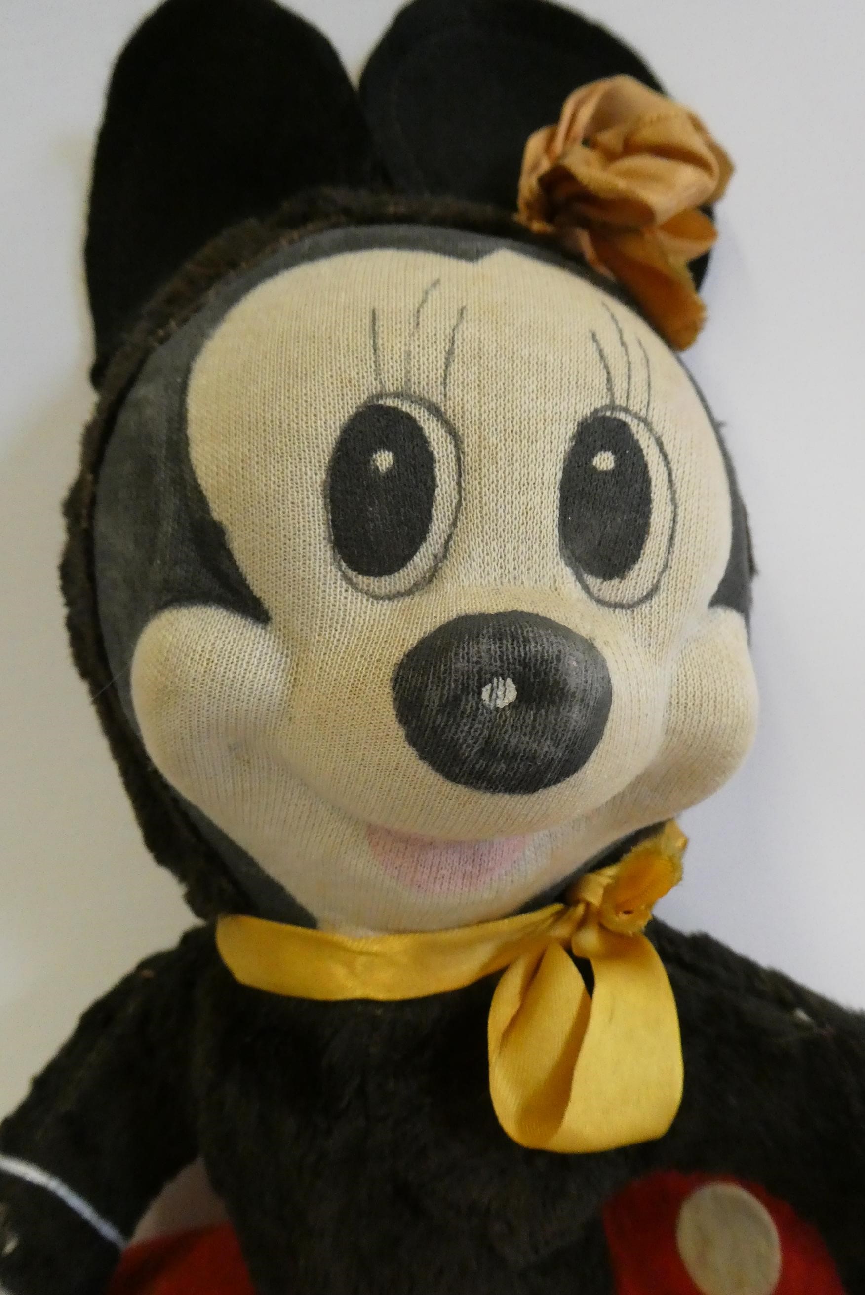 Merrythought Minnie Mouse, with fabric face, plush body, felt clothing and maker's label to foot, Image