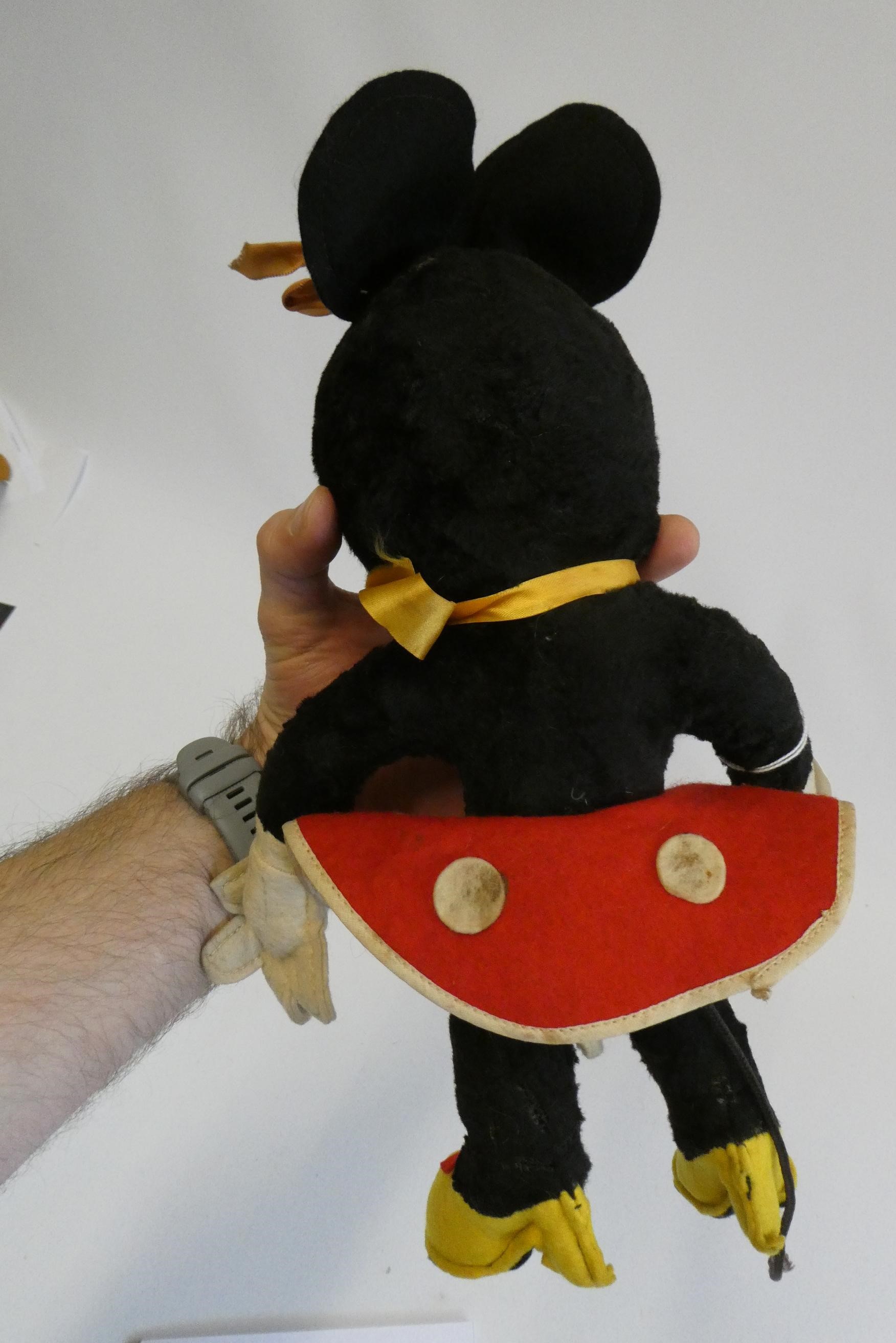 Merrythought Minnie Mouse, with fabric face, plush body, felt clothing and maker's label to foot, Image