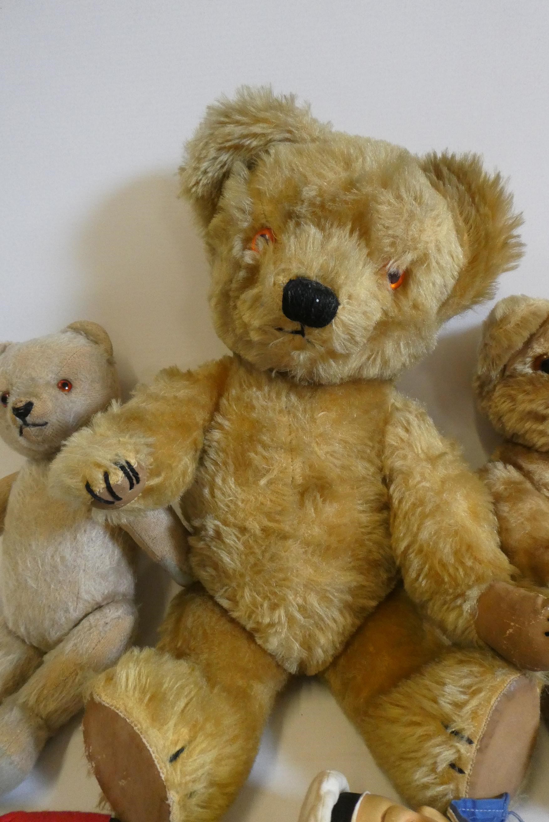 Five vintage stuffed toys, comprising a 17" Chad Valley bear with fabric label, two smaller teddy Image