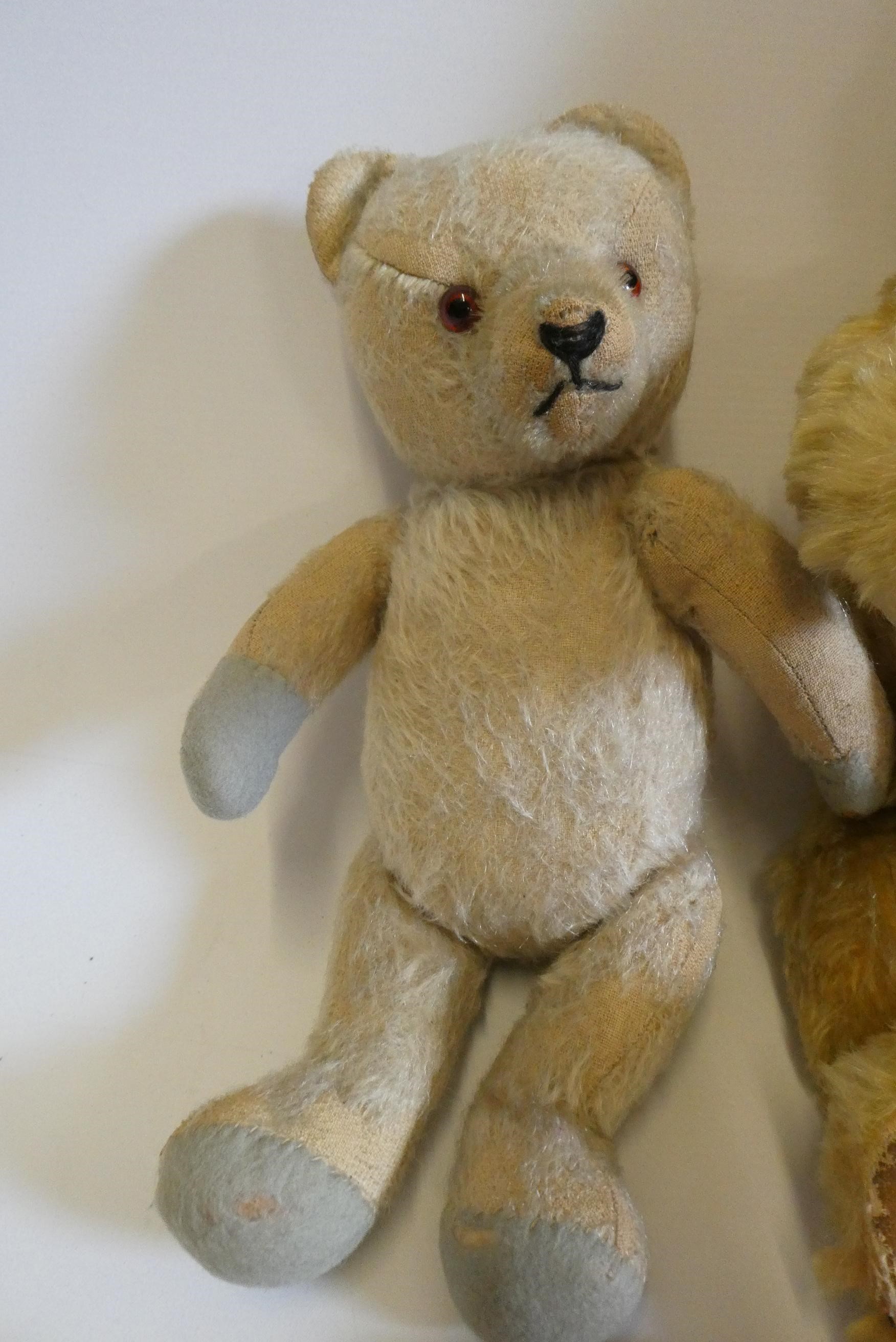 Five vintage stuffed toys, comprising a 17" Chad Valley bear with fabric label, two smaller teddy Image