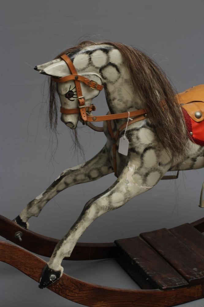 Vintage rocking horse, wooden body, glass eyes, dappled grey paint, horse hair mane and tail, Image