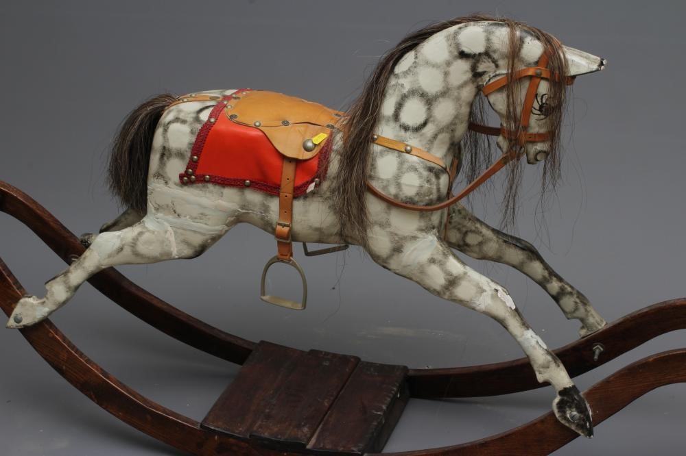 Vintage rocking horse, wooden body, glass eyes, dappled grey paint, horse hair mane and tail, Image