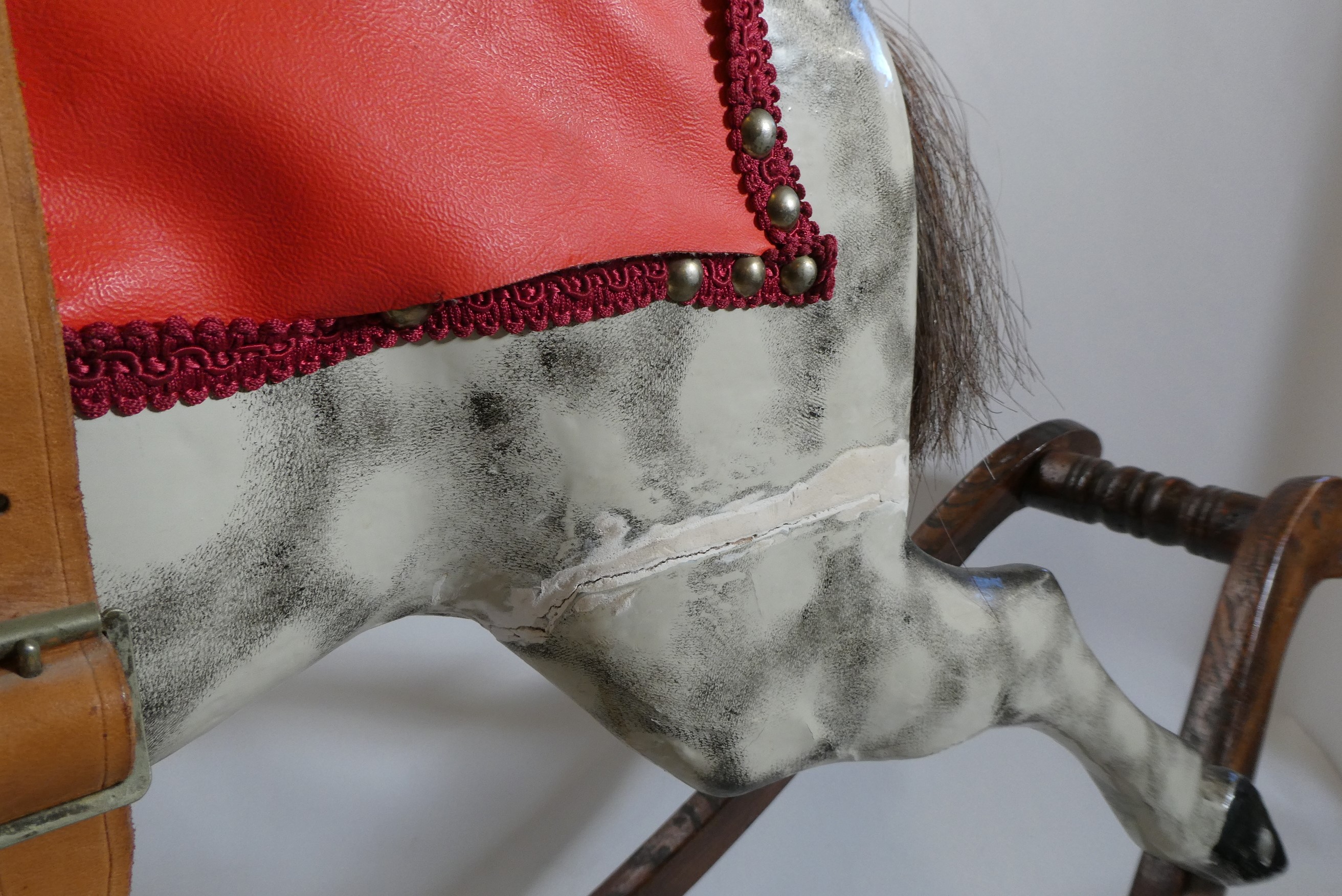 Vintage rocking horse, wooden body, glass eyes, dappled grey paint, horse hair mane and tail, Image