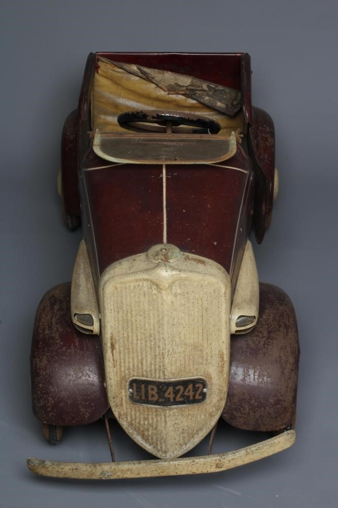 Lines Brothers vintage open tourer pedal car, pressed metal construction with maroon pin striped Image