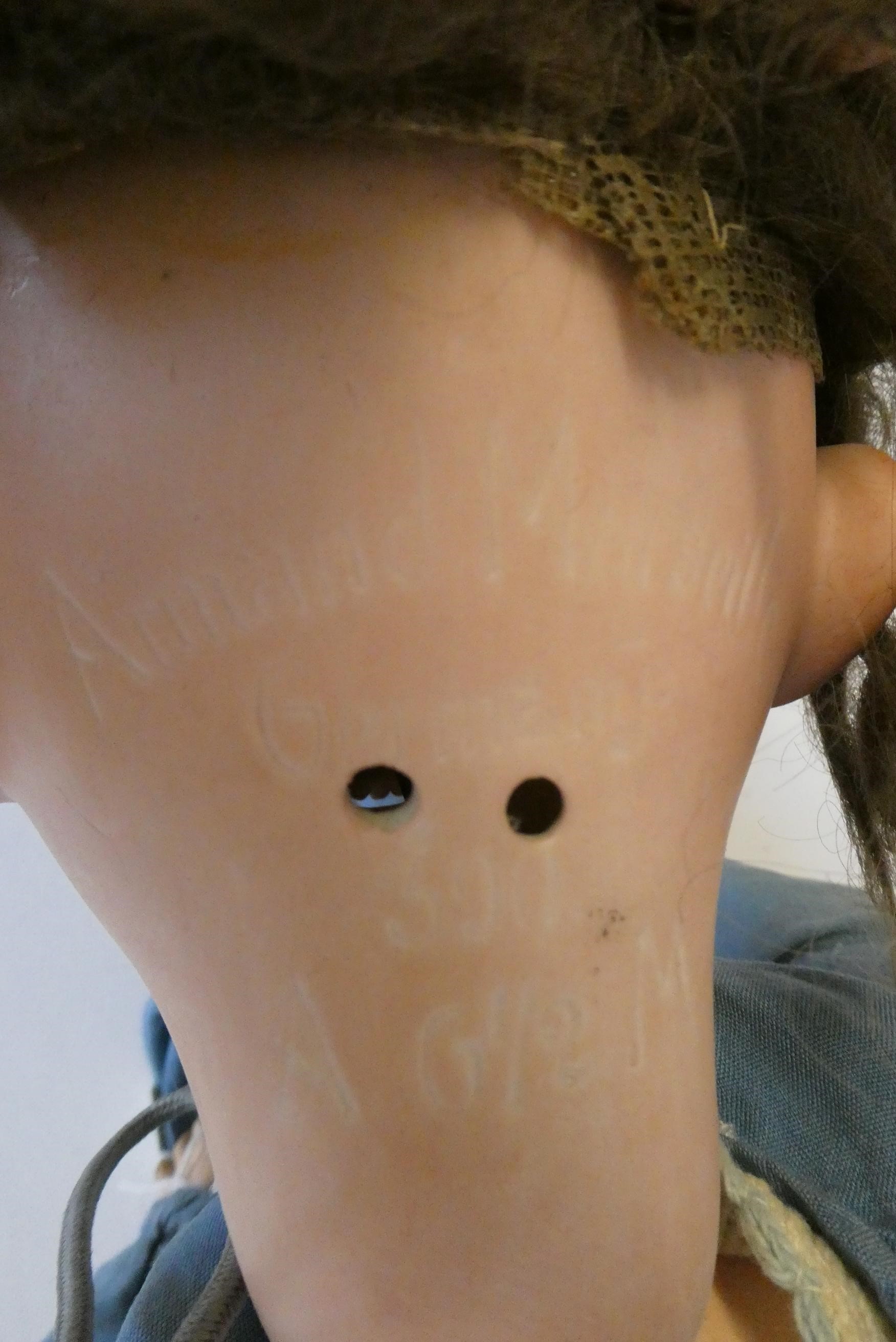 An Armand Marseille bisque socket head doll, with brown glass sleeping eyes, open mouth, teeth, wood Image