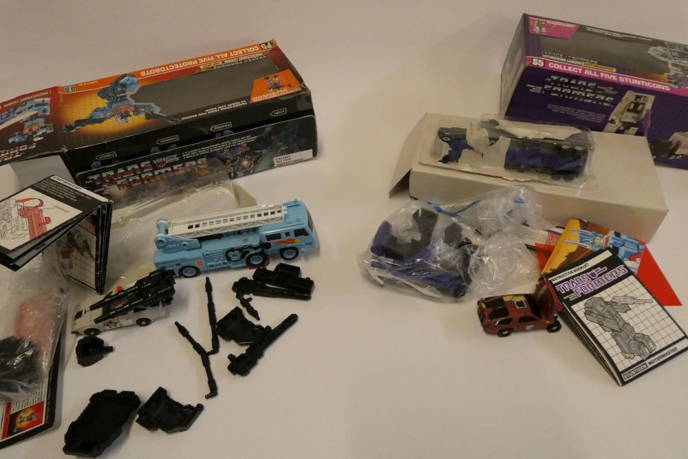 Two boxed Transformers, comprising Stunticon Leader Motormaster and Protectobot Leader Hot Spot, Image