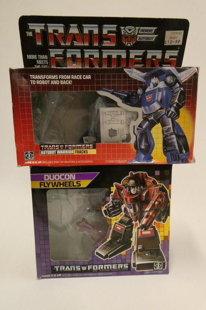 Two boxed Transformers, comprising Duocon Flywheels and Autobot Warrior Tracks, figures fair, box af Image