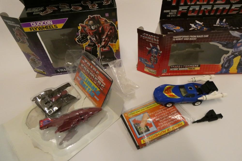 Two boxed Transformers, comprising Duocon Flywheels and Autobot Warrior Tracks, figures fair, box af Image