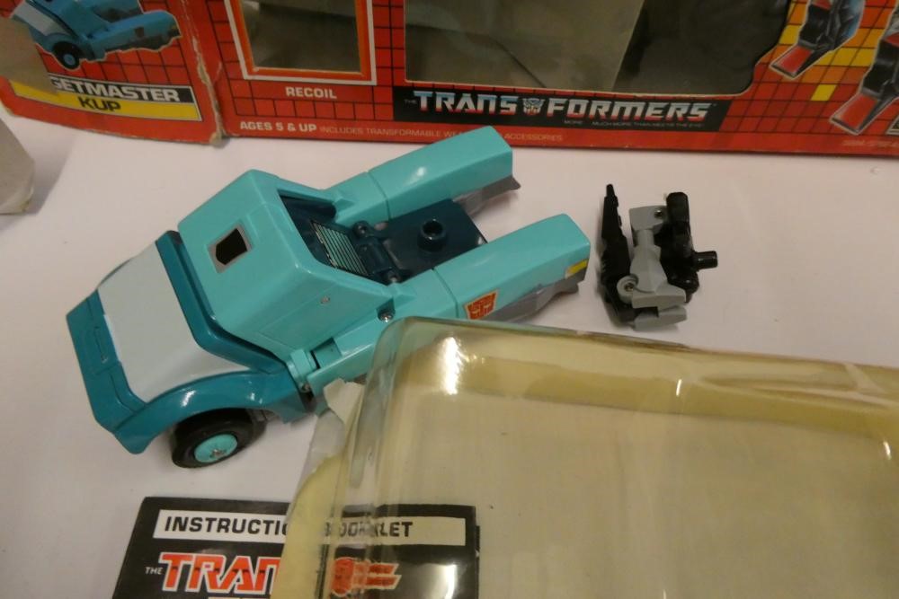 Two boxed Transformers, comprising Targetmaster Kup and Decepticon Ramjet, figures fair, box af Image