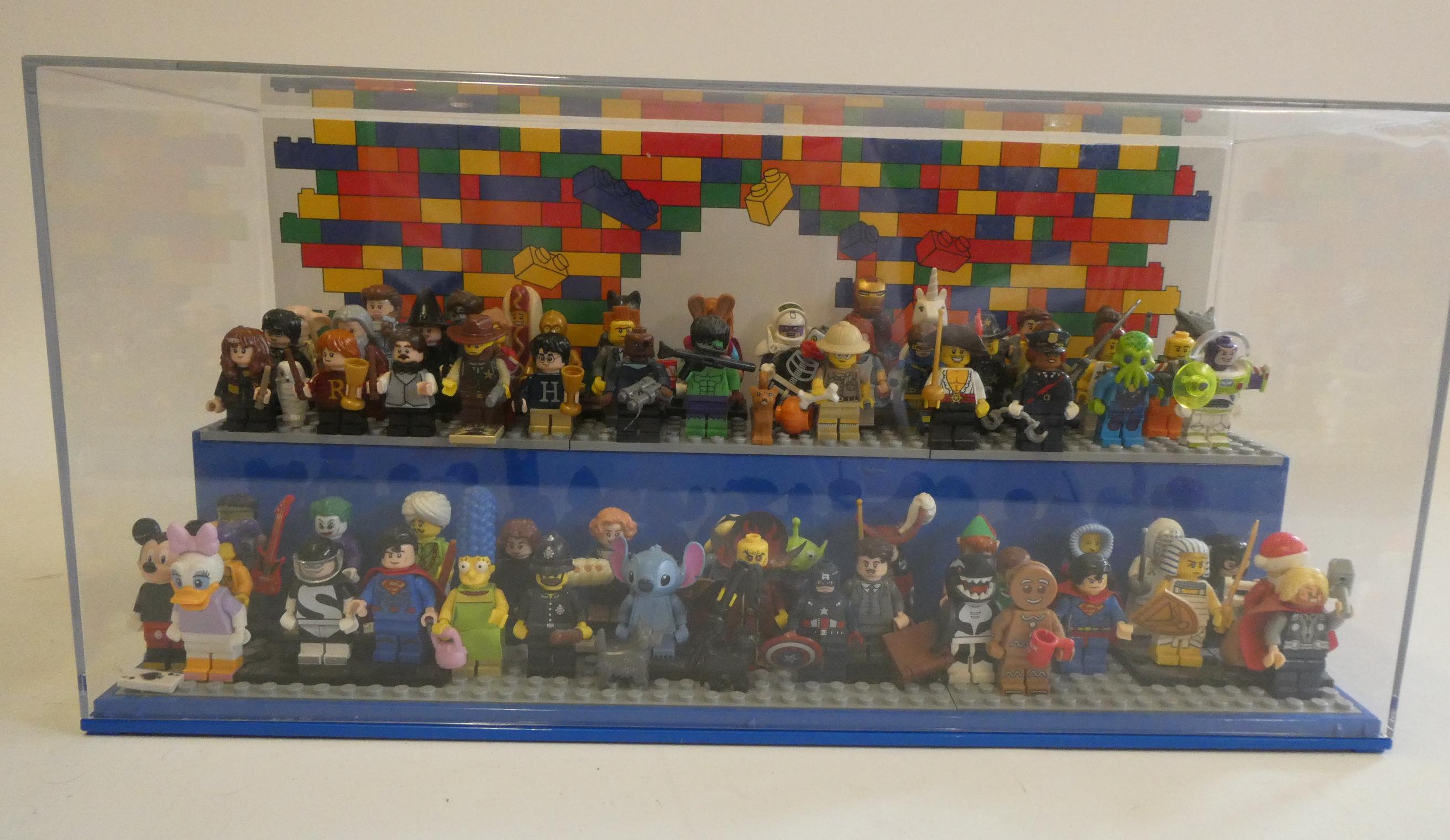 A perspex display case of Lego figures Image