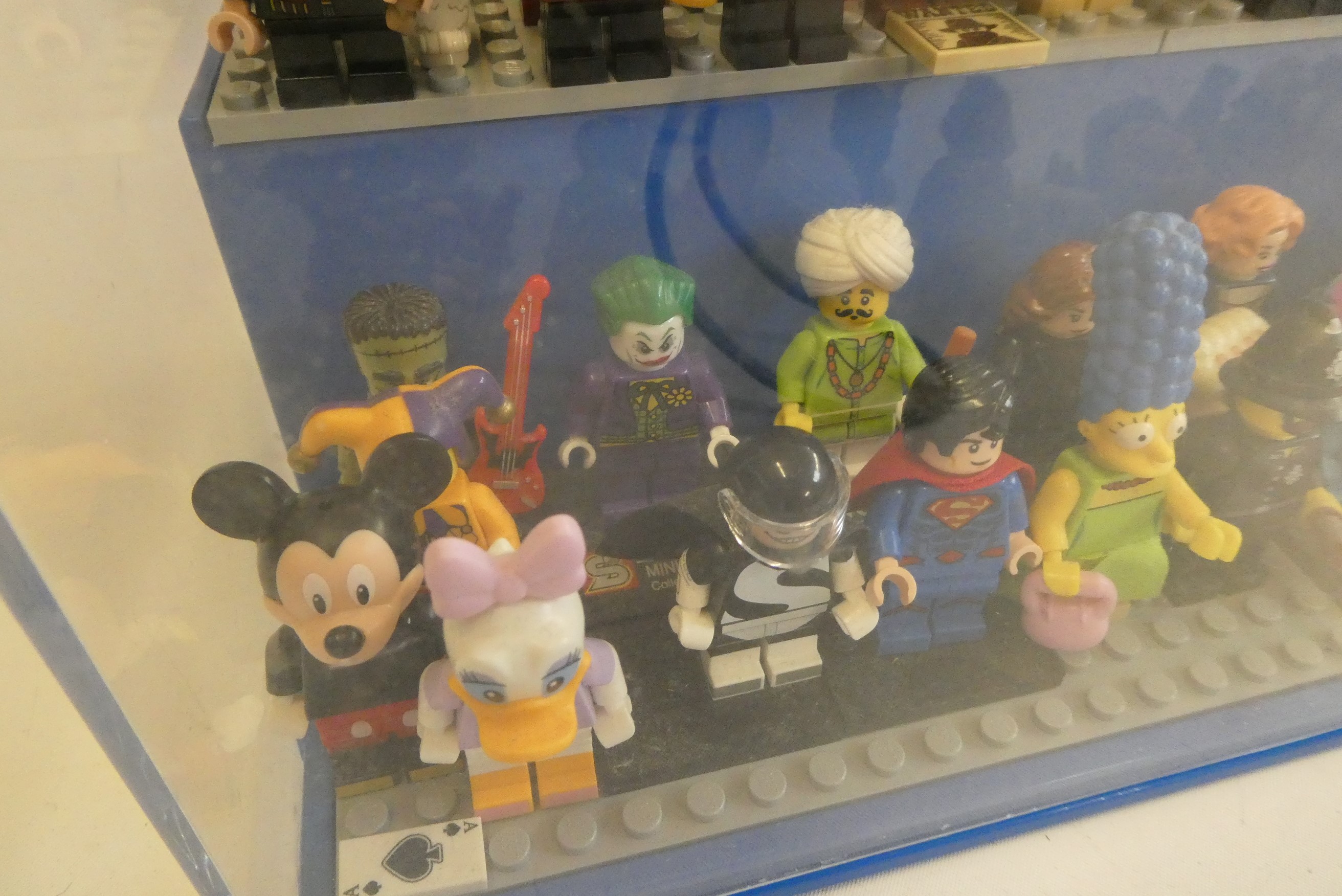 A perspex display case of Lego figures Image
