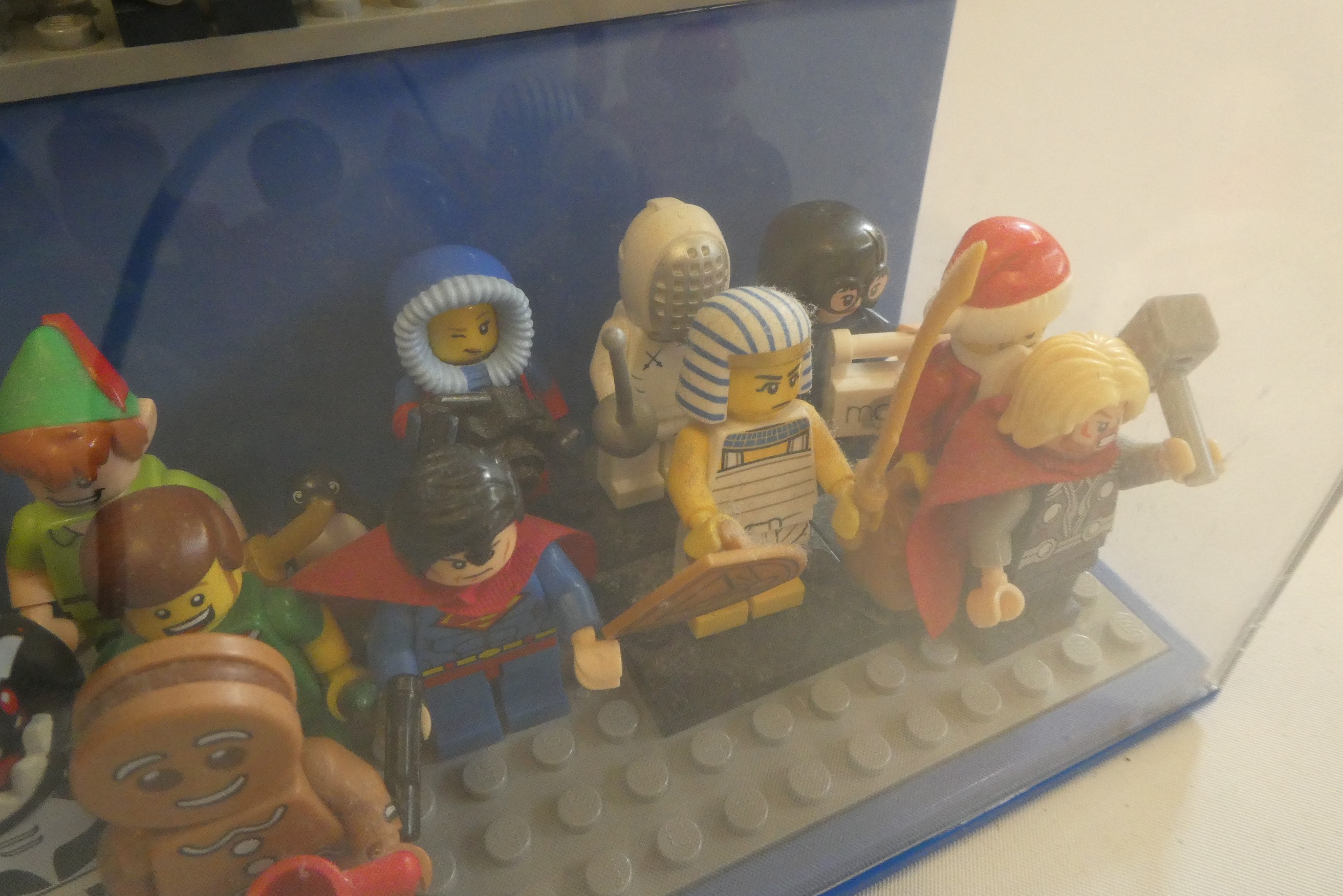 A perspex display case of Lego figures Image