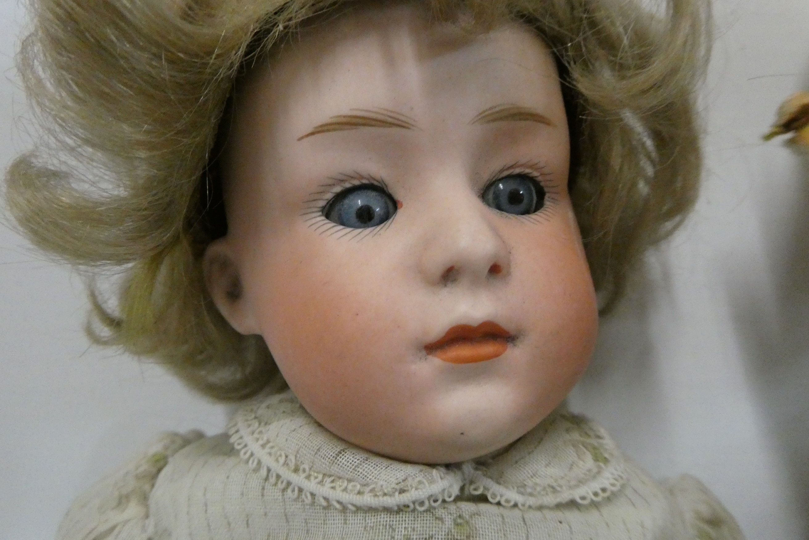 Two Heubach socket head dolls, one 11 1/2" 6970 doll with sleeping eyes, closed mouth and fixed Image