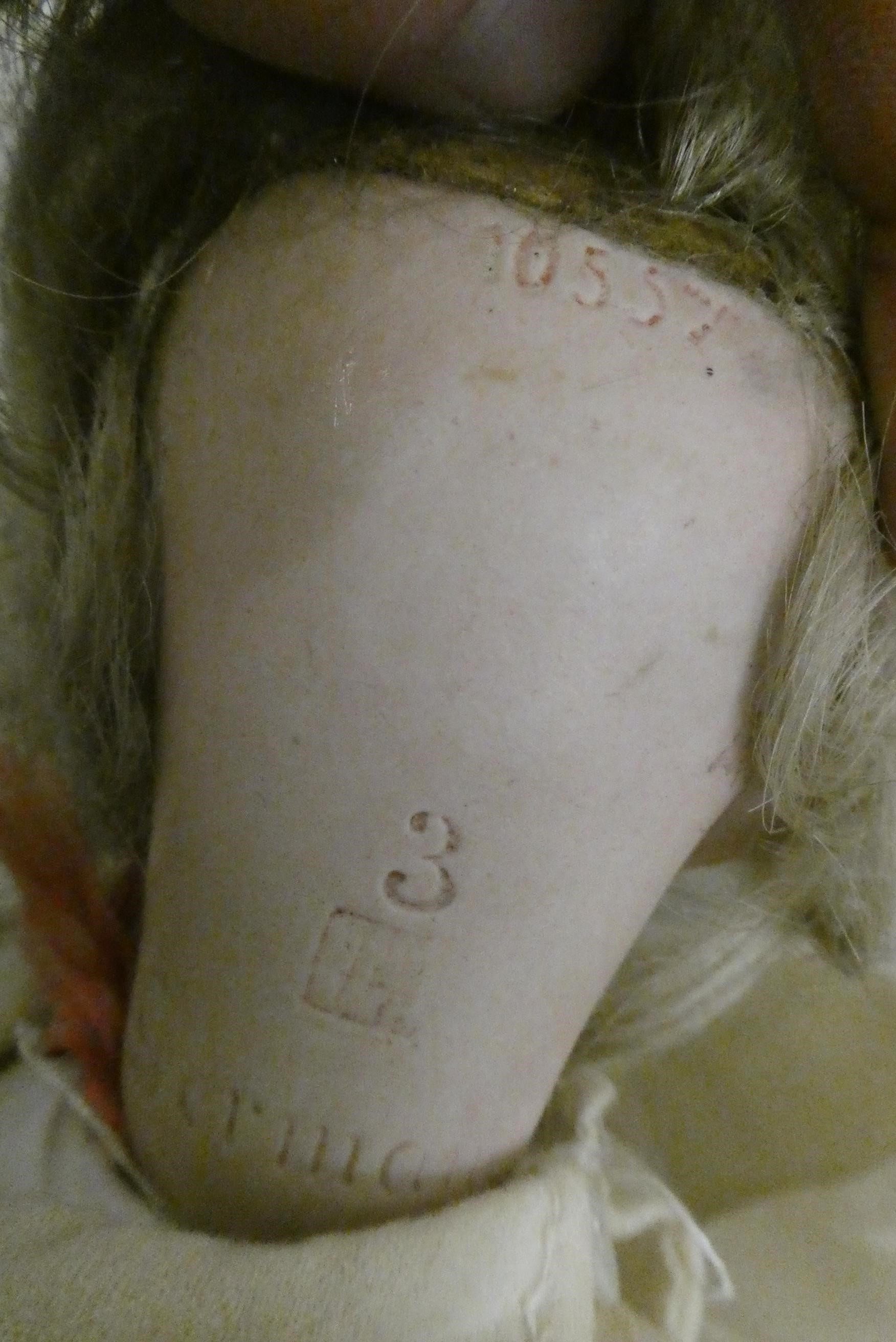 Two Heubach socket head dolls, one 11 1/2" 6970 doll with sleeping eyes, closed mouth and fixed Image
